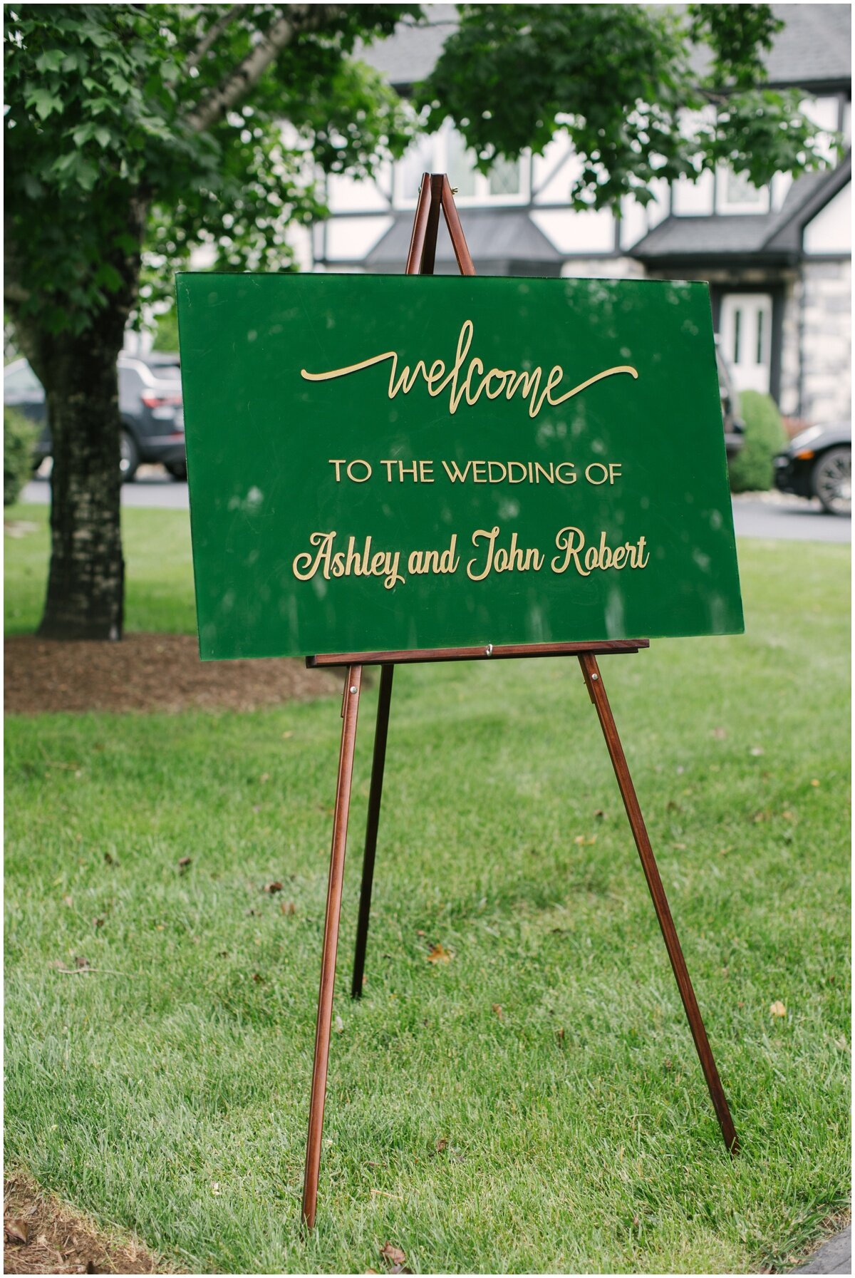  Green and gold acrylic signage during private estate wedding 