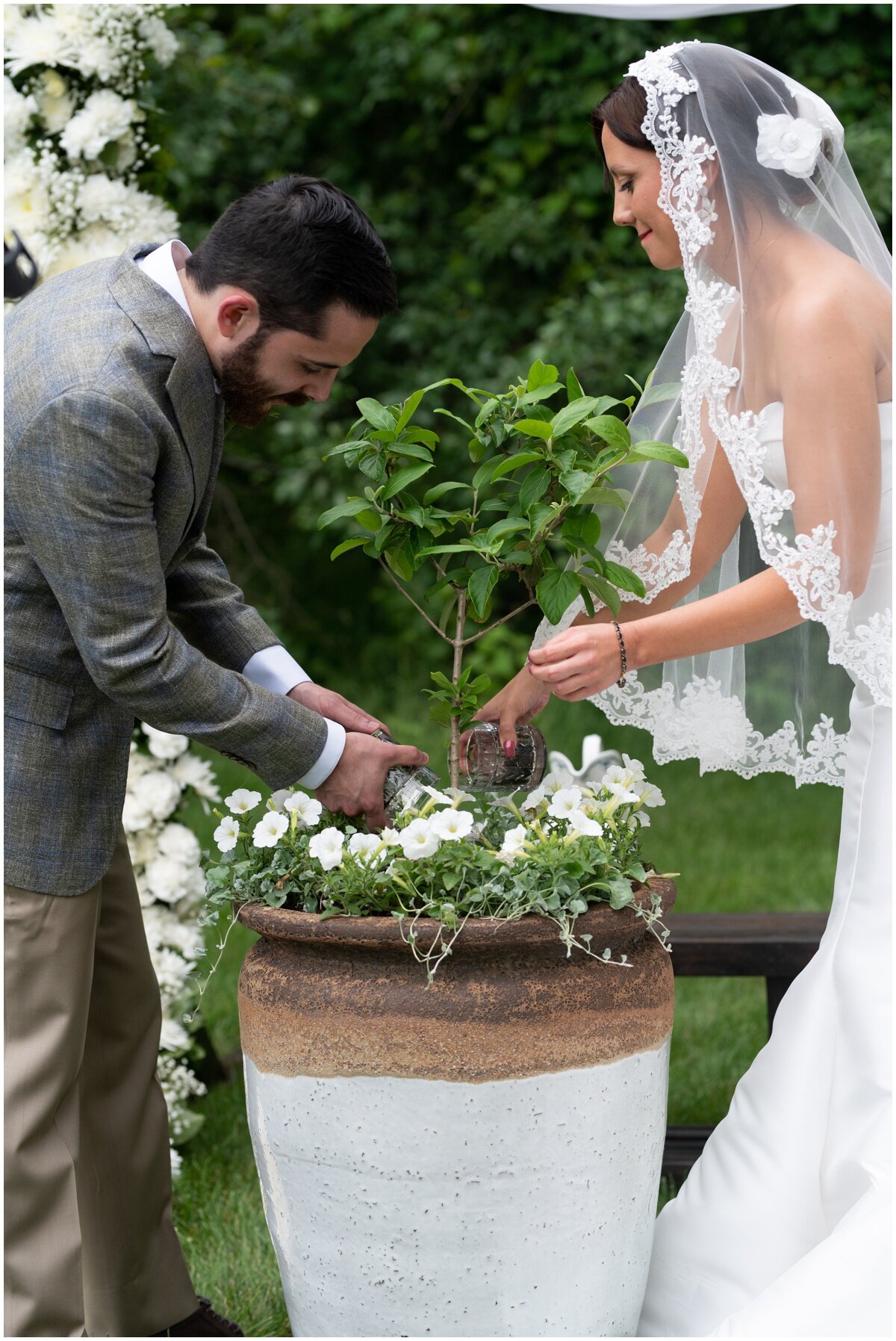  Tree planting ceremony for outdoor wedding during private estate wedding 