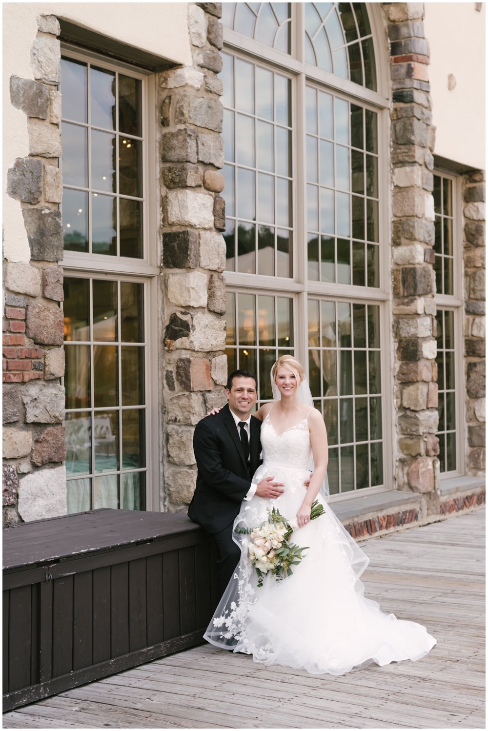 Bride and groom in front of Lake Mohawk Country Club | NKB Photo 