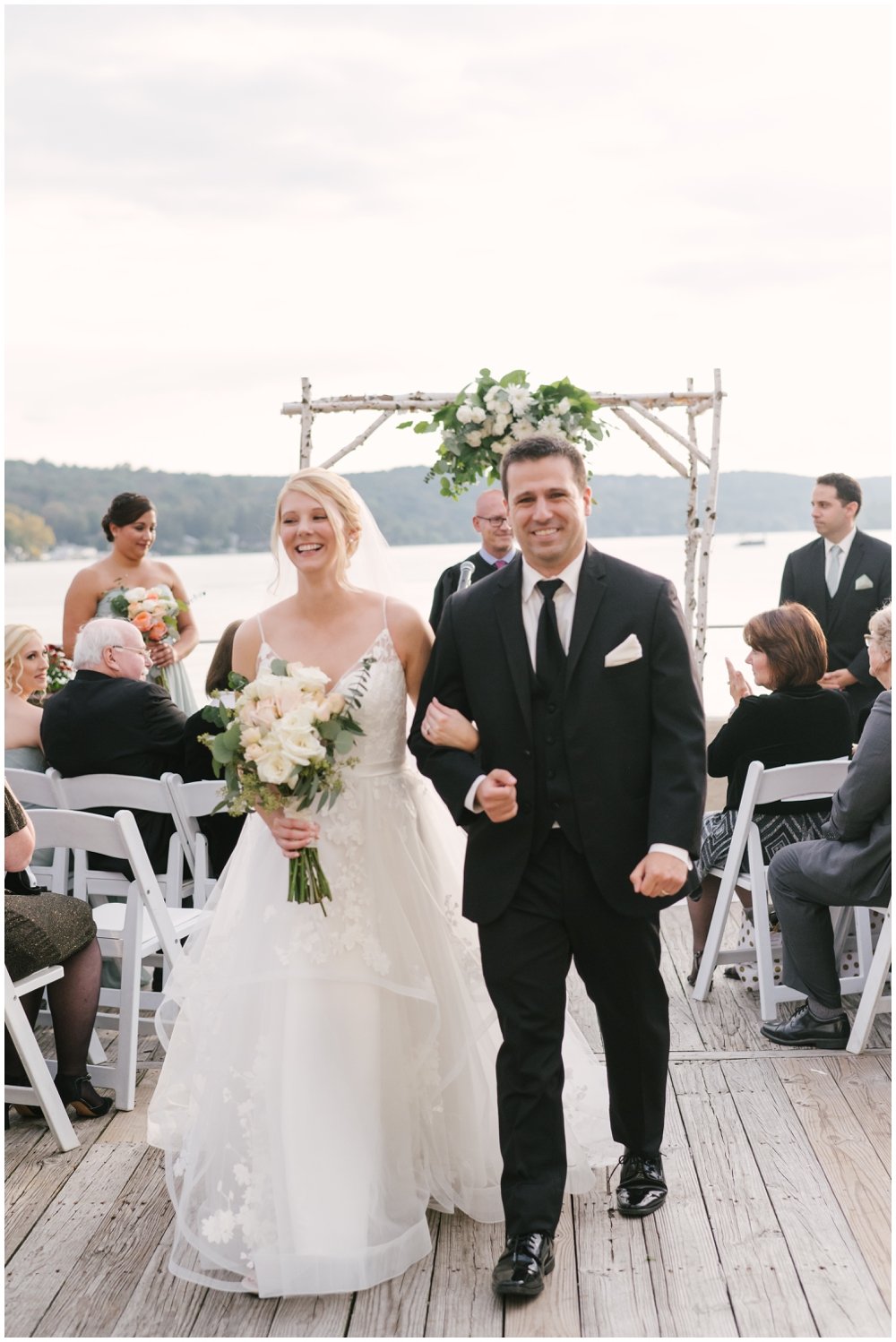 Bride and groom exiting ceremony at Lake Mohawk Country Club Wedding | NKB Photo