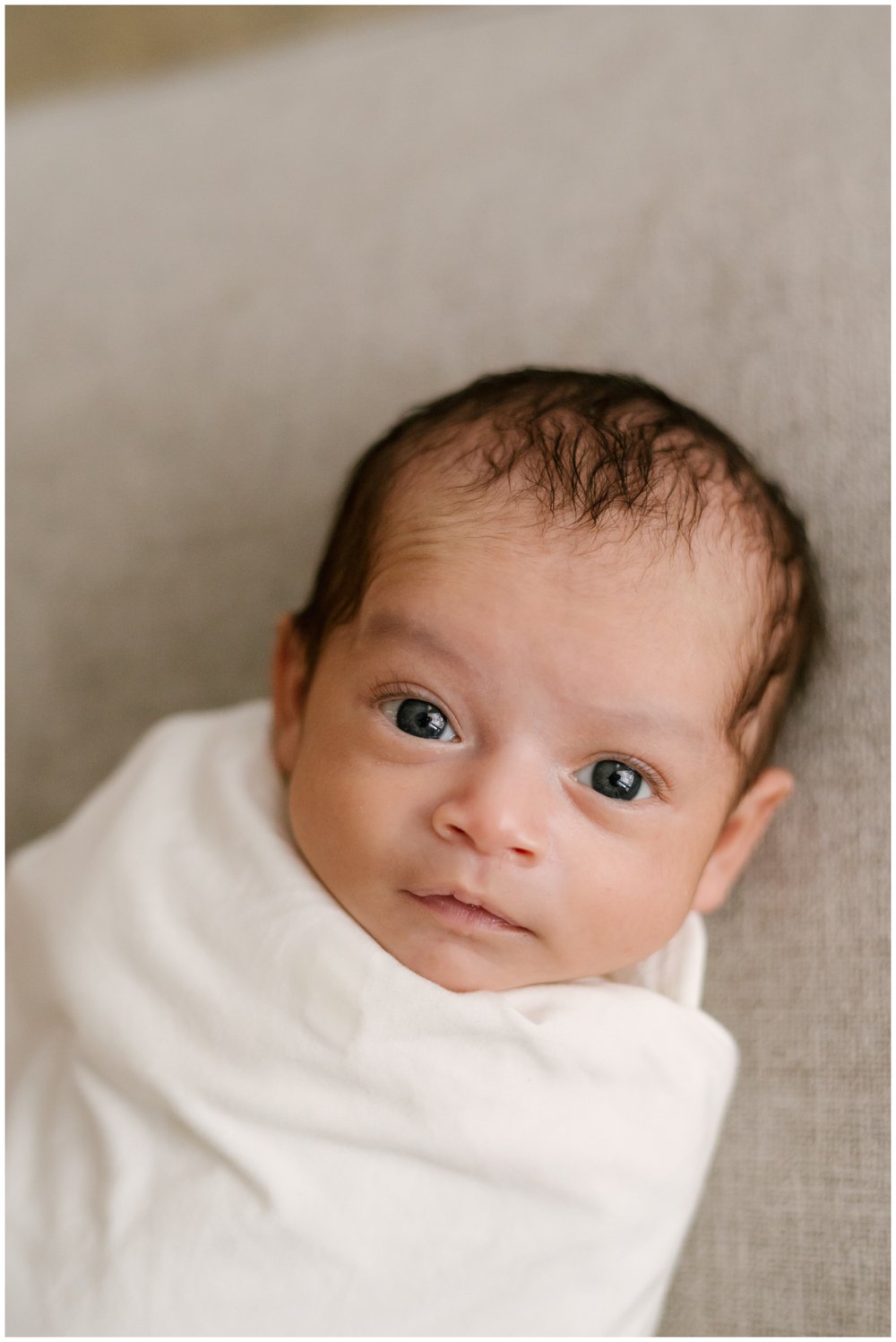Newborn looking at camera | NKB Photo | Hospital Bag Checklist for Baby