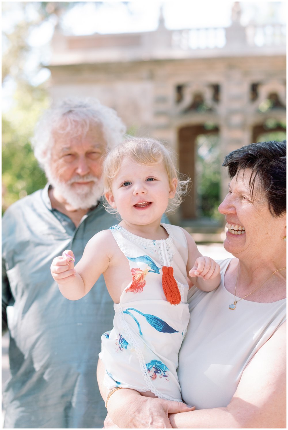 Grandparents with granddaughter at Vizcaya Museum and Gardens with family beach photographer | NKB Photo
