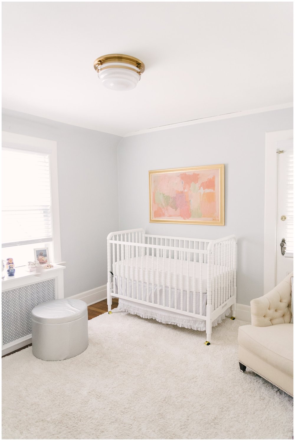 White crib with pink abstract painting by Fort Lauderdale photographer in newborn session | NKB Photo