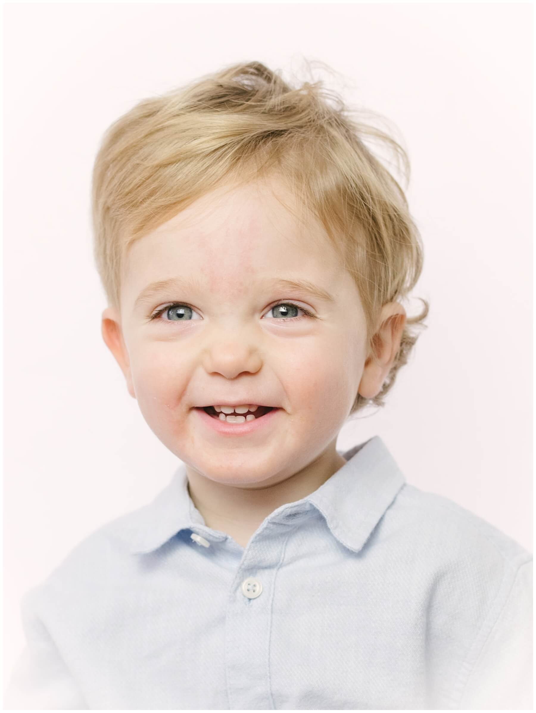 Heirloom portrait of toddler boy in blue shirt | NKB Photo