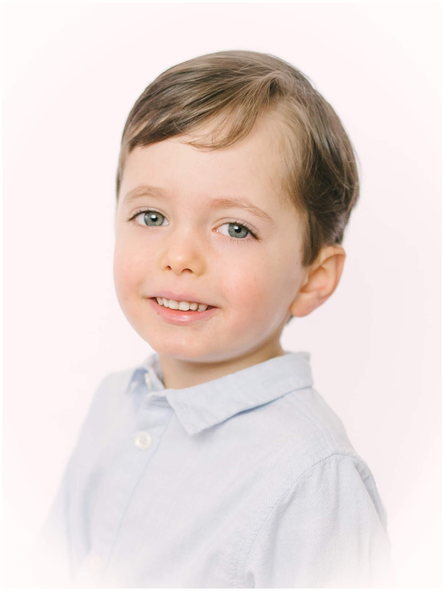 Heirloom portrait of toddler boy in blue shirt | NKB Photo