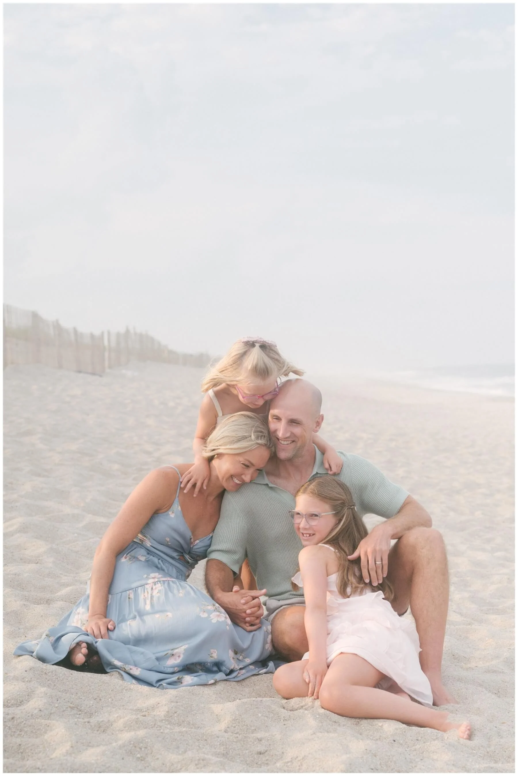 Candid family photo on the beach | NKB Photo