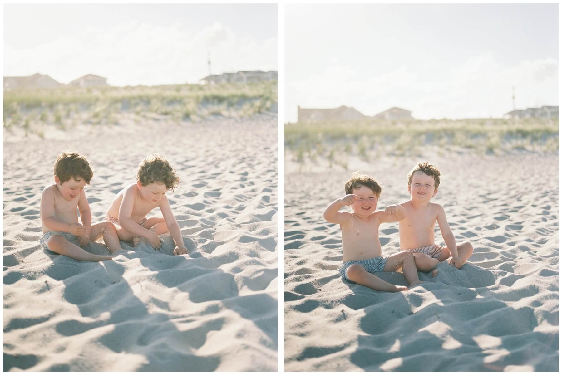 Brothers playing in the sand on the beach | NKB Photo