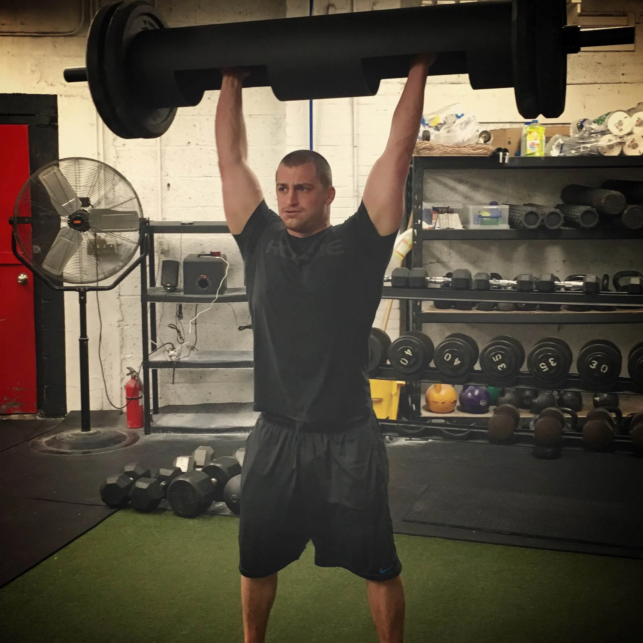 Coach Haught with Log Press