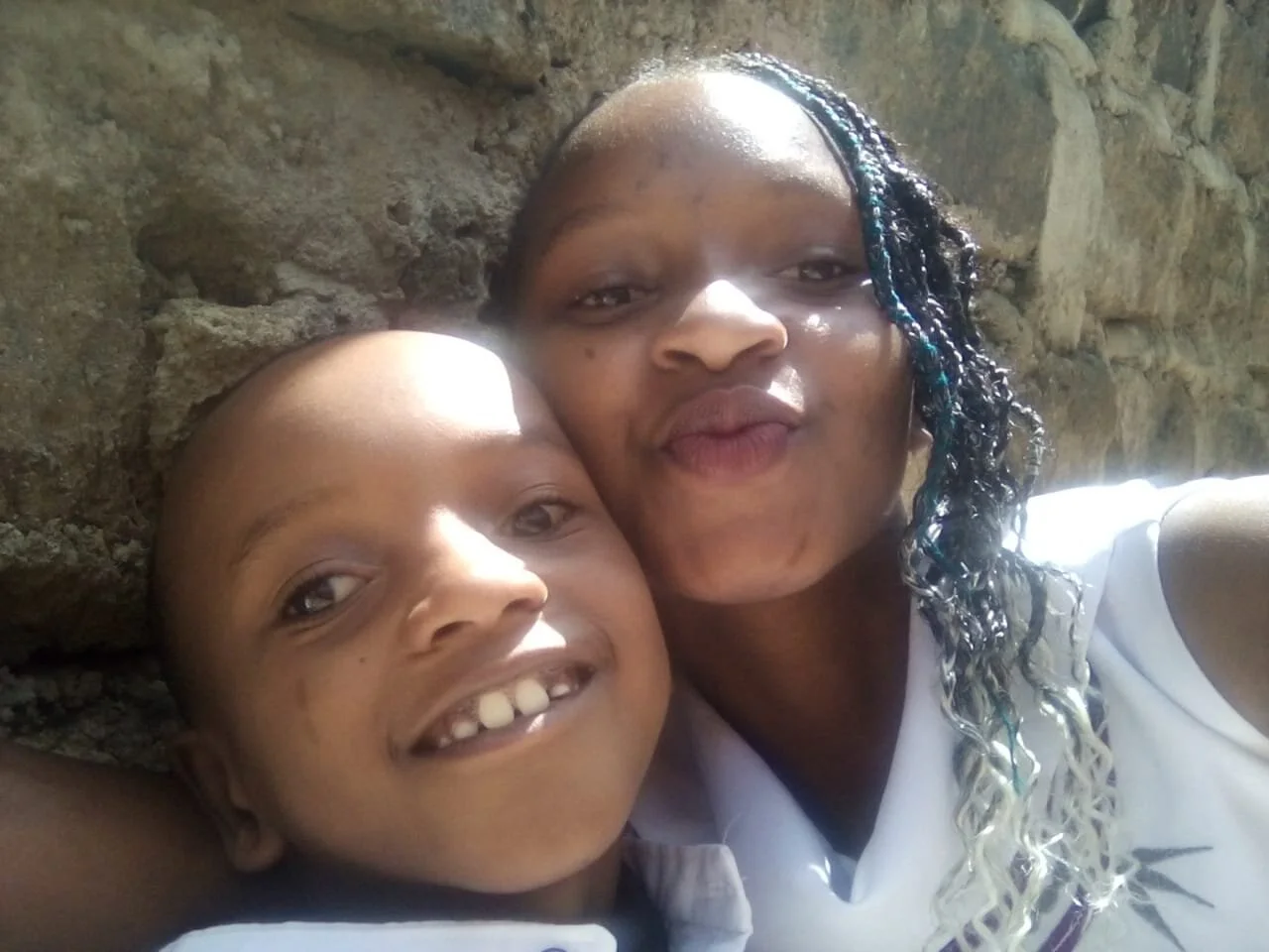 Mburu with his sister