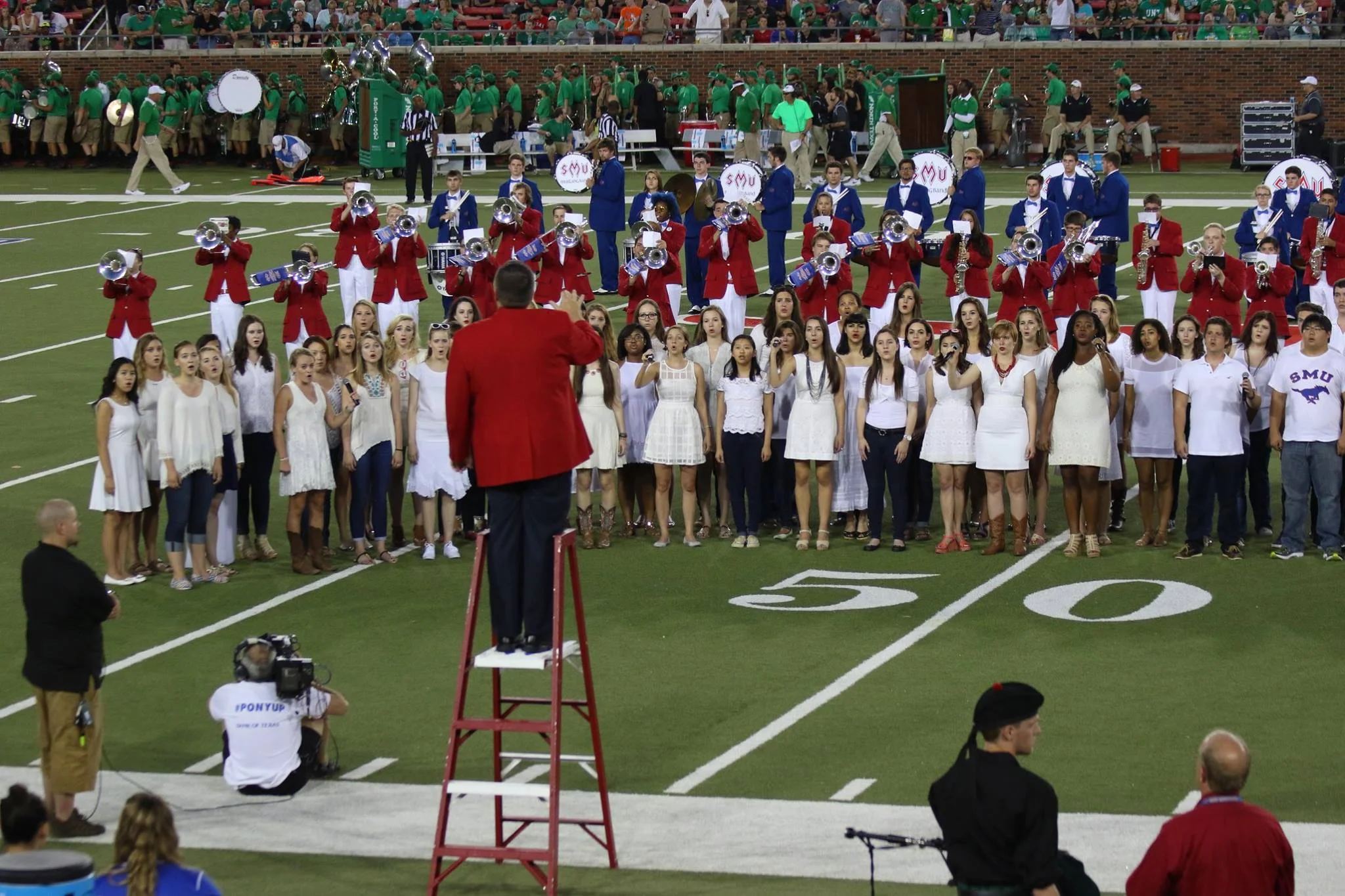 The SMU Meadows Choirs performed "America, the Beautiful" at an SMU football game in remembrance of 9/11.
