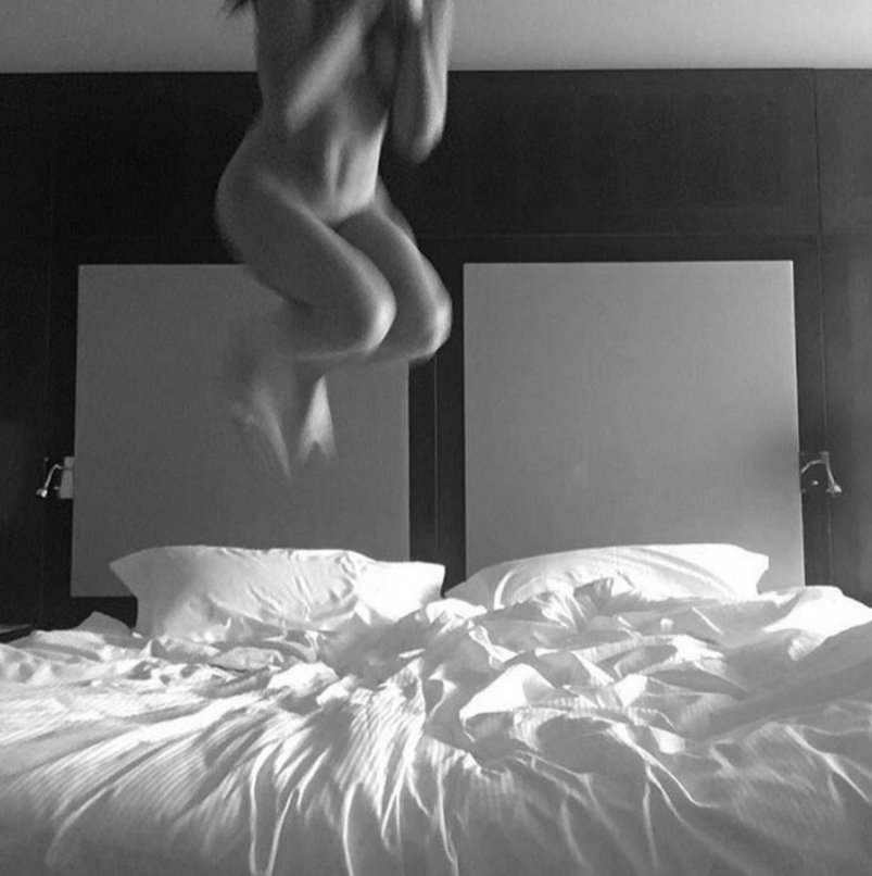 Self Portrait jumping on bed in Nice.jpg