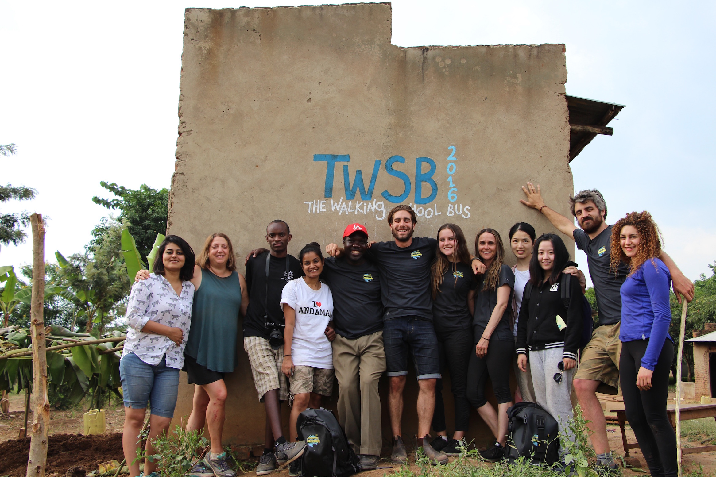 TWSB Team (from left to right) Sukriti, Lainie, Ally, Ruchi, Enosh (Head of Putti Village), Aaron, Samantha, Michelle, Shirley, Lynne, Leo, and Eli standing to the right of the garden we just planted. 