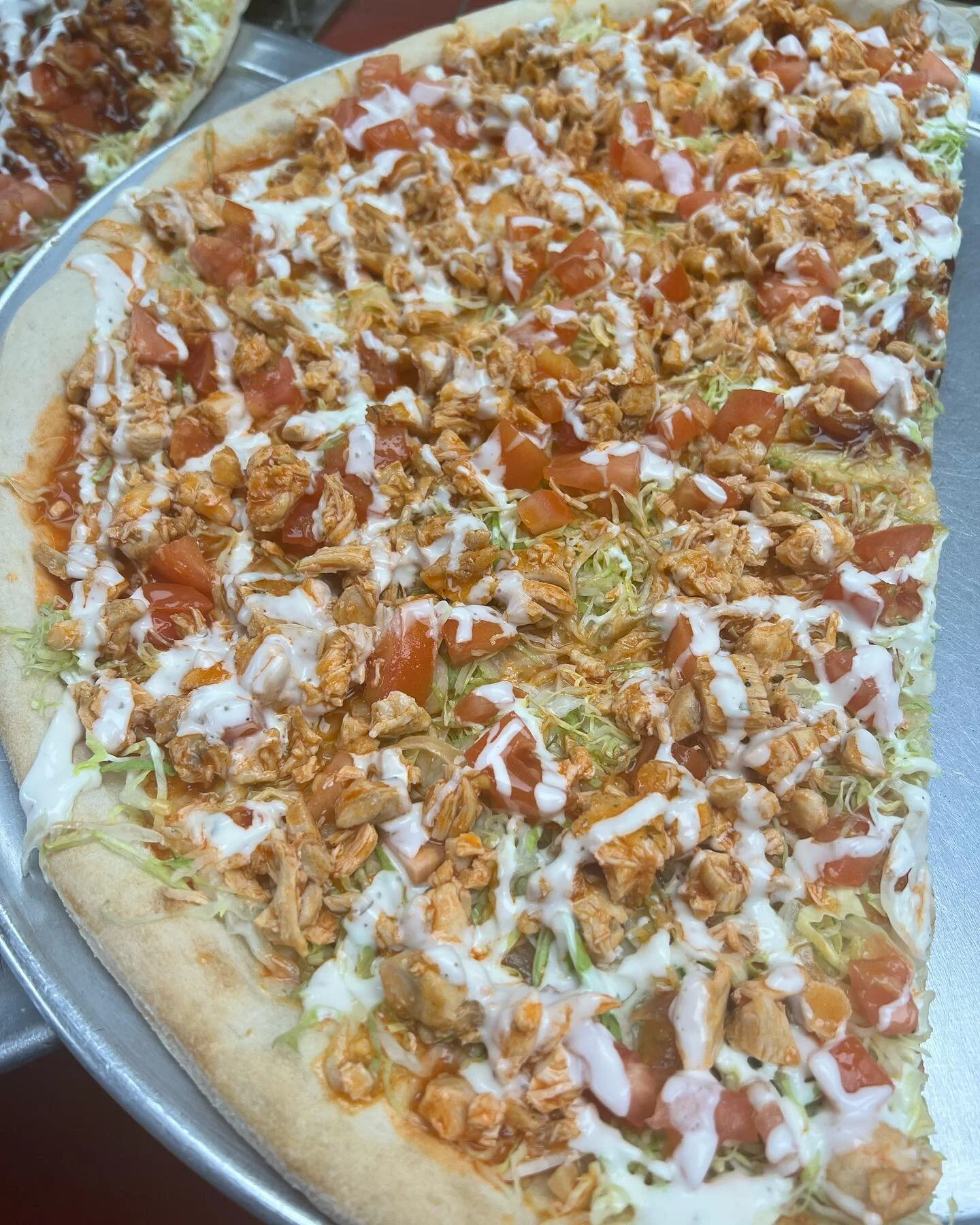 BUFFALO CHICKEN CHEESESTEAK PIZZA
