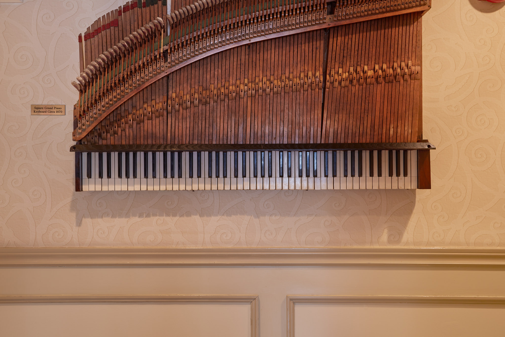 1 of 6 Pieces of 1870 Square Grand Piano That Adorn the Lobby Walls