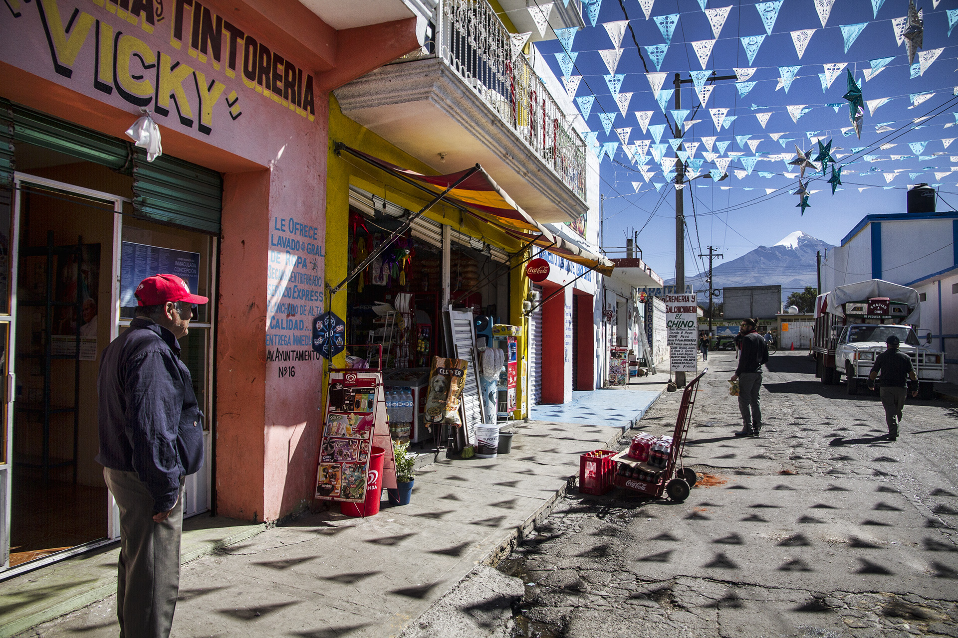  To try to blend in as an ice-axe-wielding, six-foot gringo carrying two jugs of water and a roll of toilet paper through the center of a small Mexican mountain town is a fruitless endeavor. We venture out anyway. The morning is bright as the village