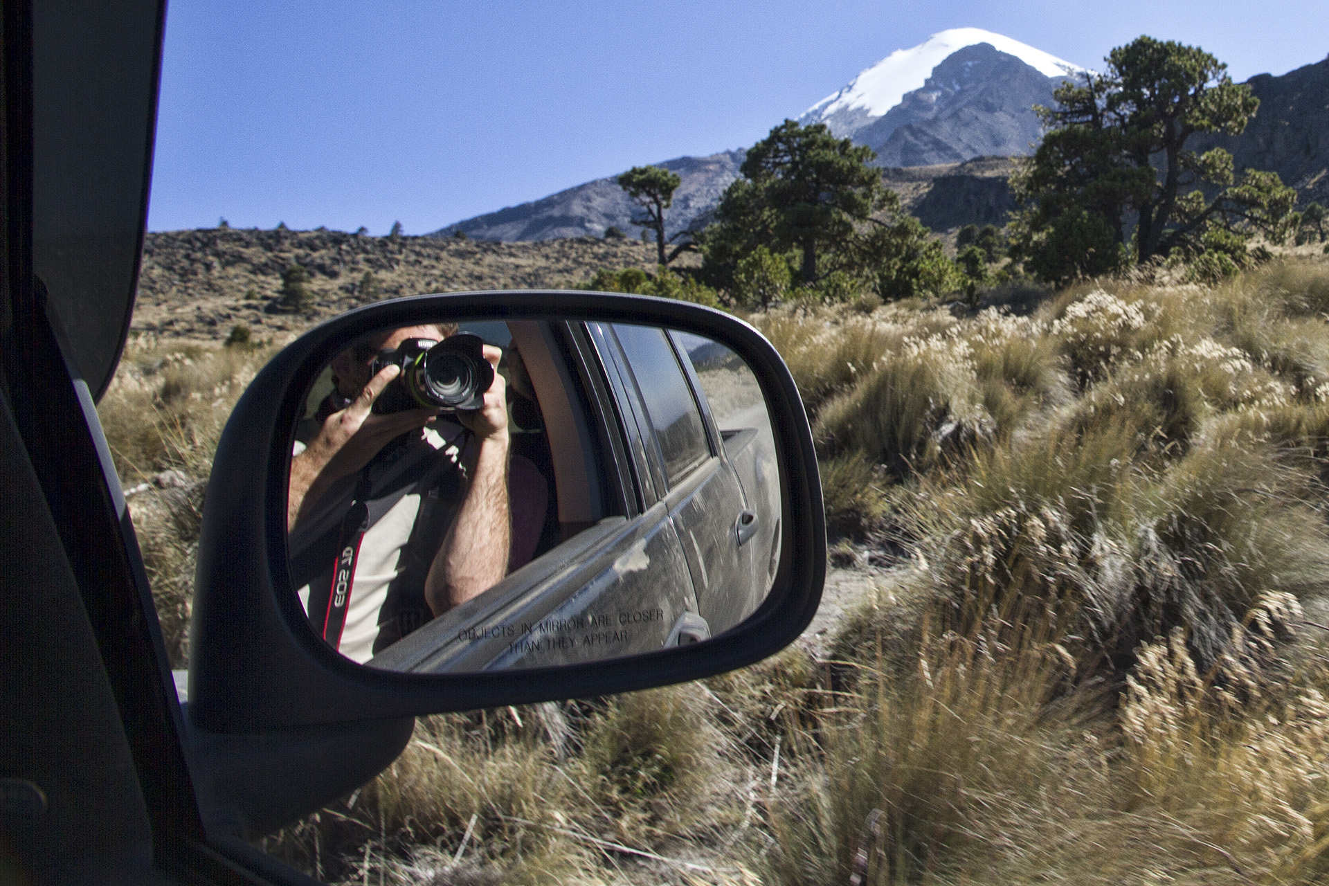  Joel, our driver, asks us about our lives in the United States as he guides the bulky truck up the rutted back road, taking us from 9,000 feet a.s.l. to nearly 14,000 feet a.s.l. The routes on the glacier start to become apparent.&nbsp; 