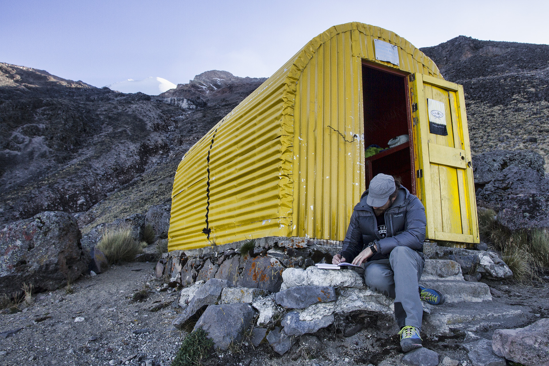  A couple hundred feet away from the  Piedra Grande  hut, a small, yellow tin shed hut sits amongst the car-sized boulders. The small space inside the hut is just large enough for the both of us and our gear.&nbsp; 