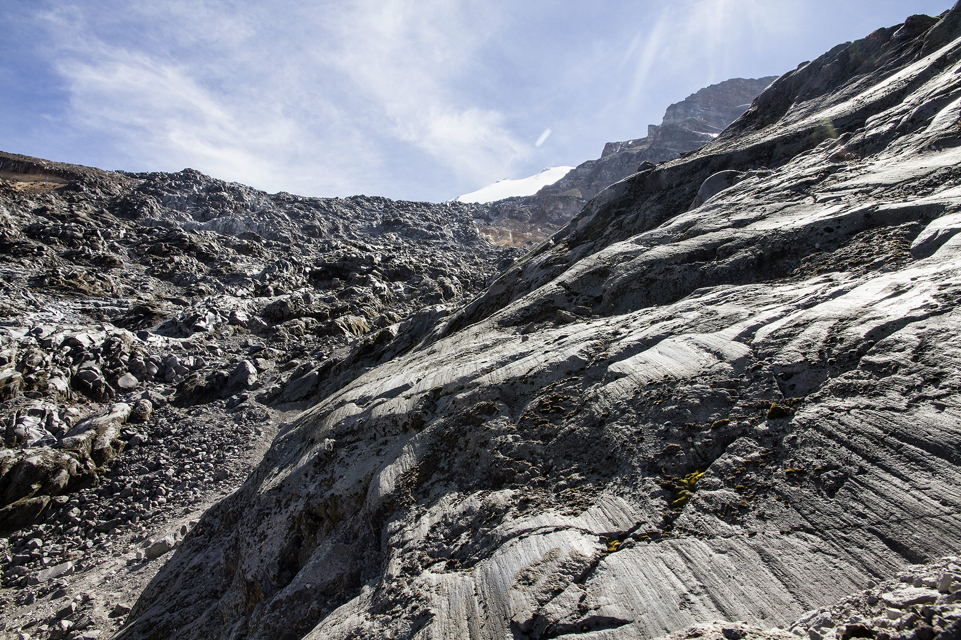  Part way through the Labyrinth, we cross paths with the Korean. We had tracked his tiny figure from base camp as it progressed slowly across the upper parts of the glacier in the morning. He tells us the going was slow because the glacier is icy and