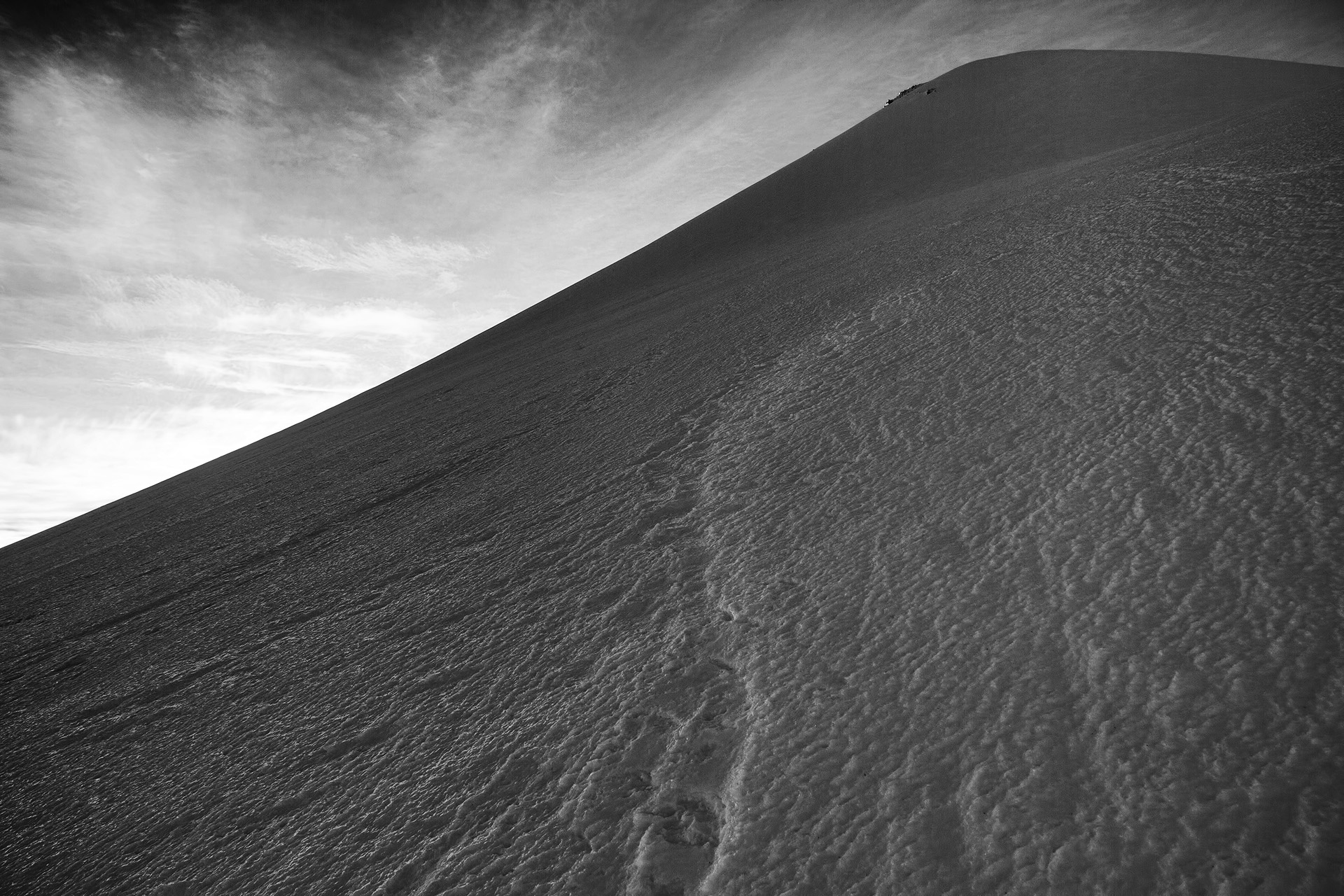  A glacier is an inherently lonely place, but its layers preserve the stories of days long gone. Each careful bite of crampons into its icy flank is a small wound that must be inflicted to ensure your story’s continuation.&nbsp; 