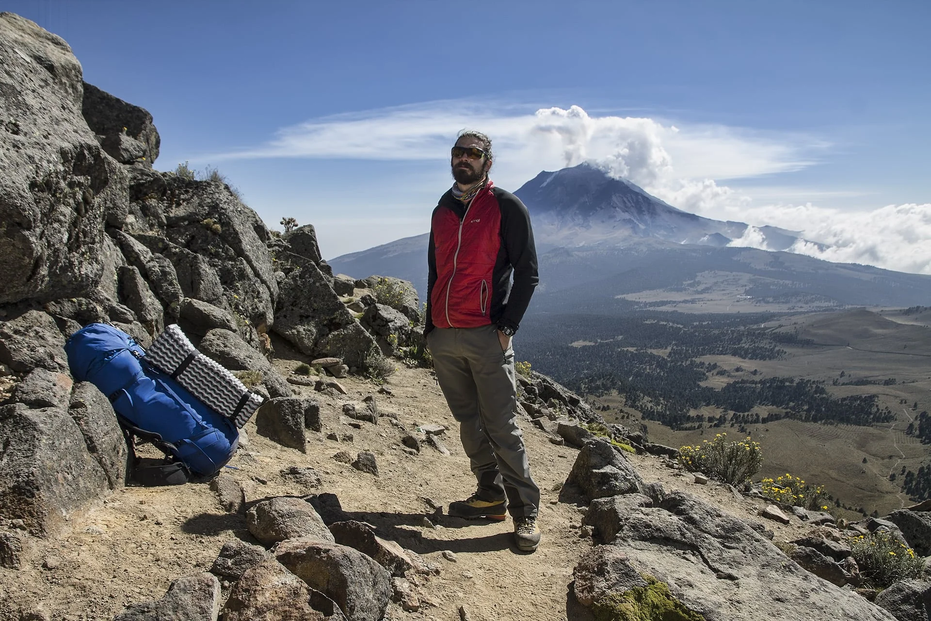 It is in the middle of photographing a small eruption on Popocatépetl that my camera ceases to function. My heart sinks. My shutter mechanism has locked up and my attempts to revive the body are futile. My mood begins to slip away as I curse my luck. In his non-chalant way, Jordan silently extends his own camera toward me. Take it. 