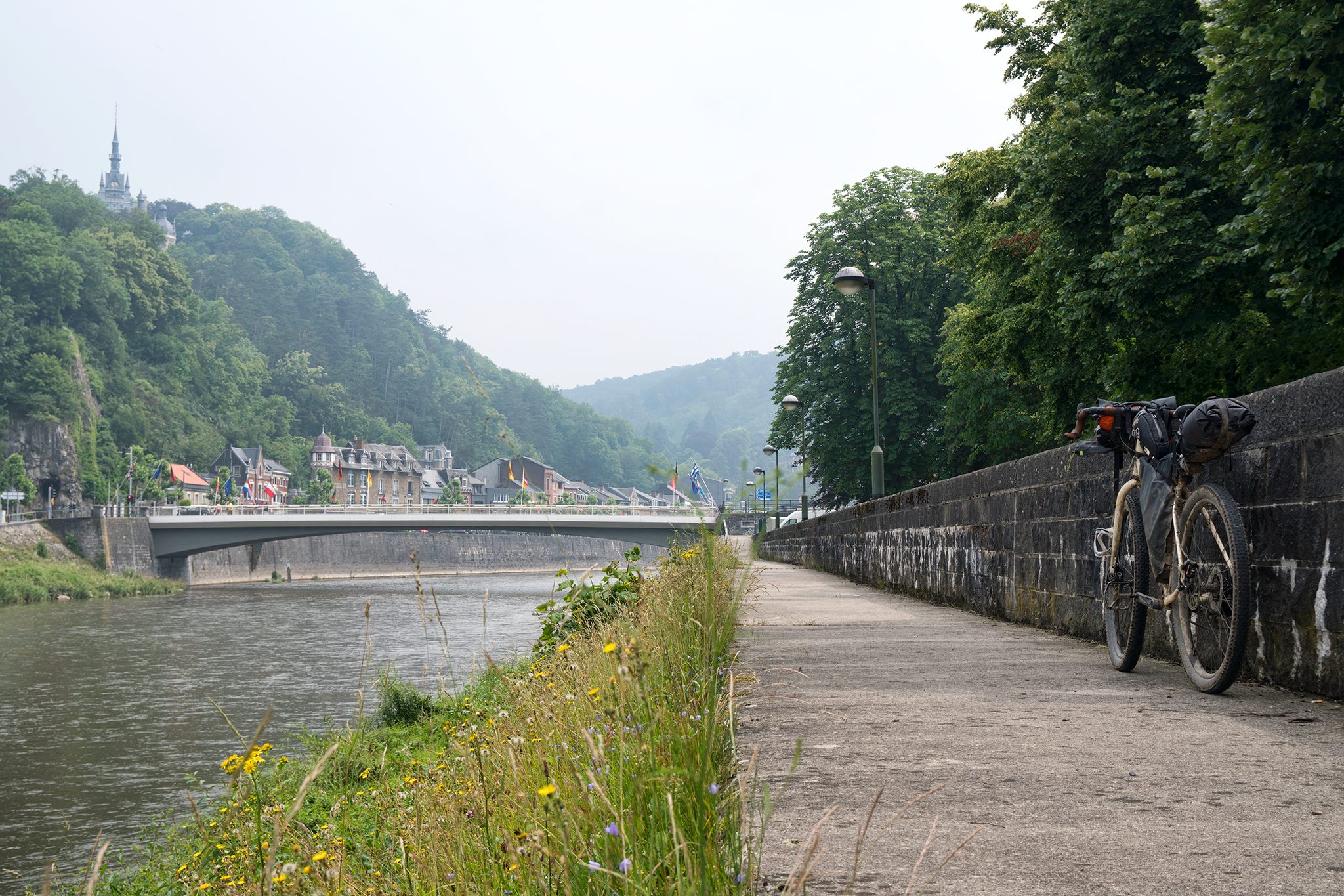  I pop out of the forest onto the banks of the Ourthe river, 15 kilometers south of Liège. A paved cycle path, the RV7, follows the meandering river into the heart of the city where the best  gaufres  on the planet can be found.  I pick up speed and 