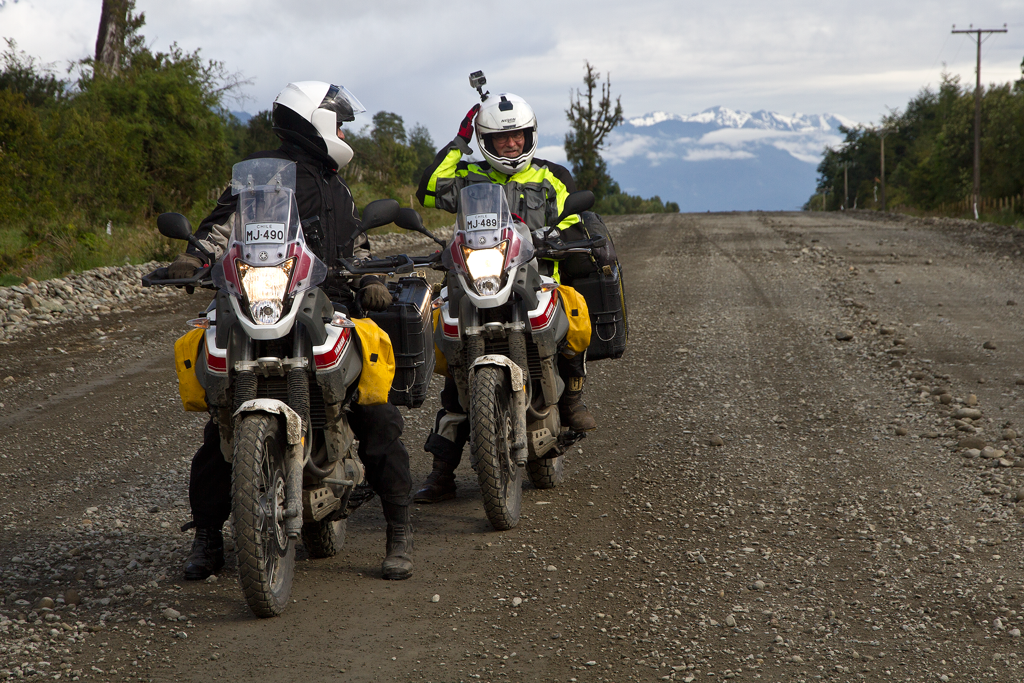  Dad’s eyebrows raised slightly at the skid marks leading toward my spot in the road, where I was in the process of lifting the motorcycle back onto its wheels. “Ça va?”  “Yea. I fell, but I’m ok.” My shoulder ached, but it was my pride that had take