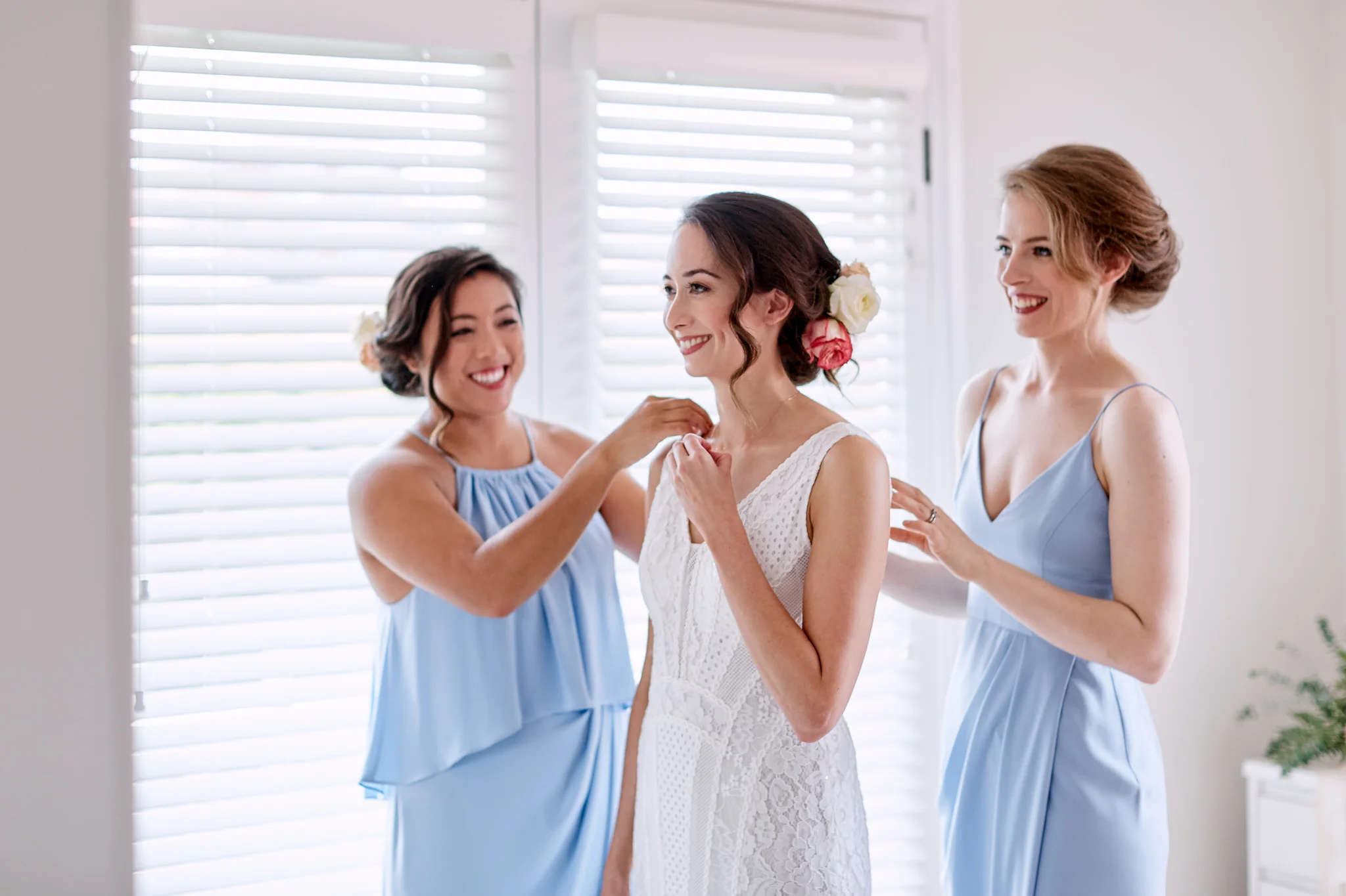bride putting necklace on.jpg