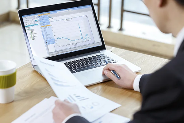 businessman checking financial reports
