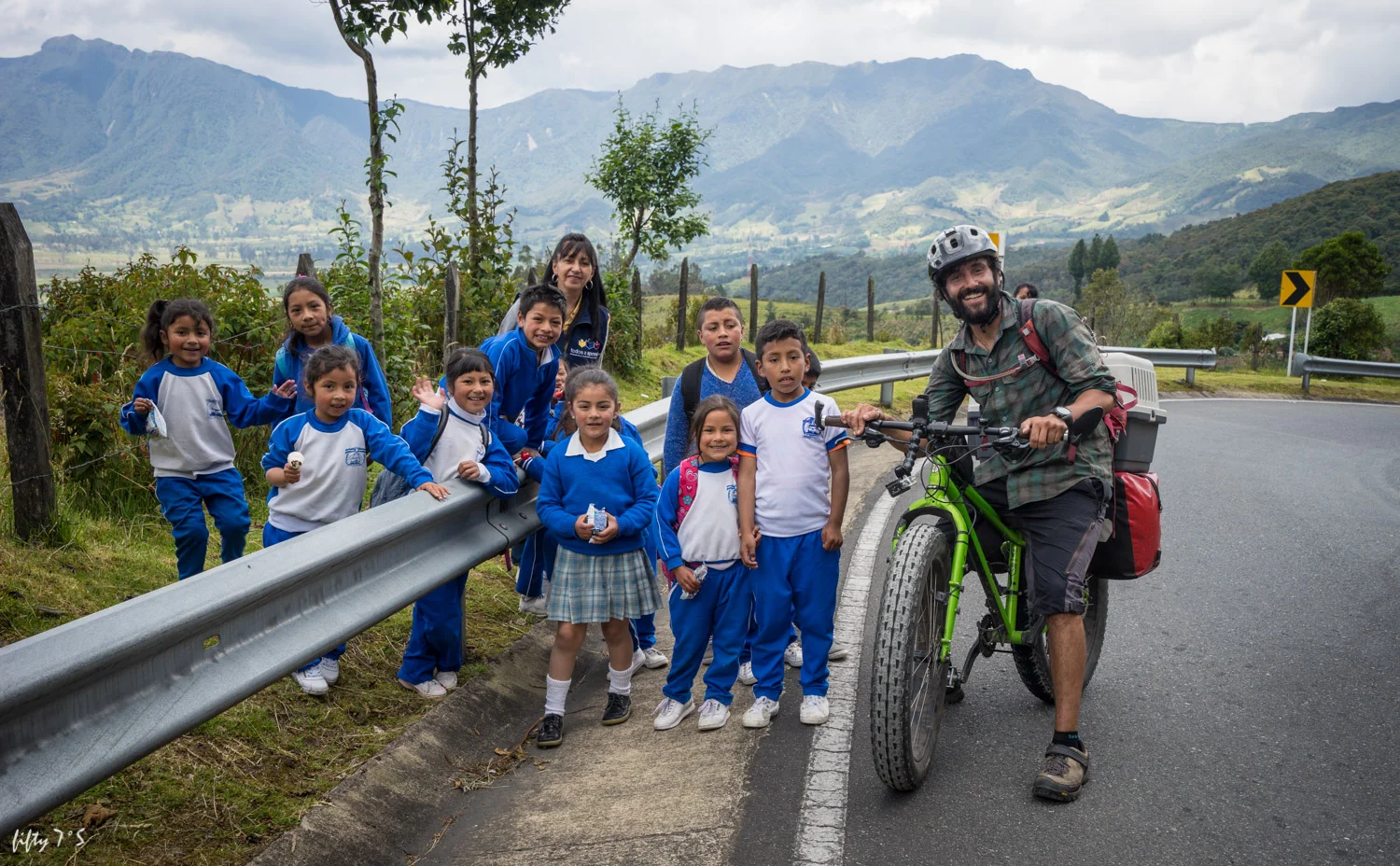 Climbing a steep hill at 5km per hour, we bumped into a group of school kids. They started racing us up the hill and kept us entertained :)