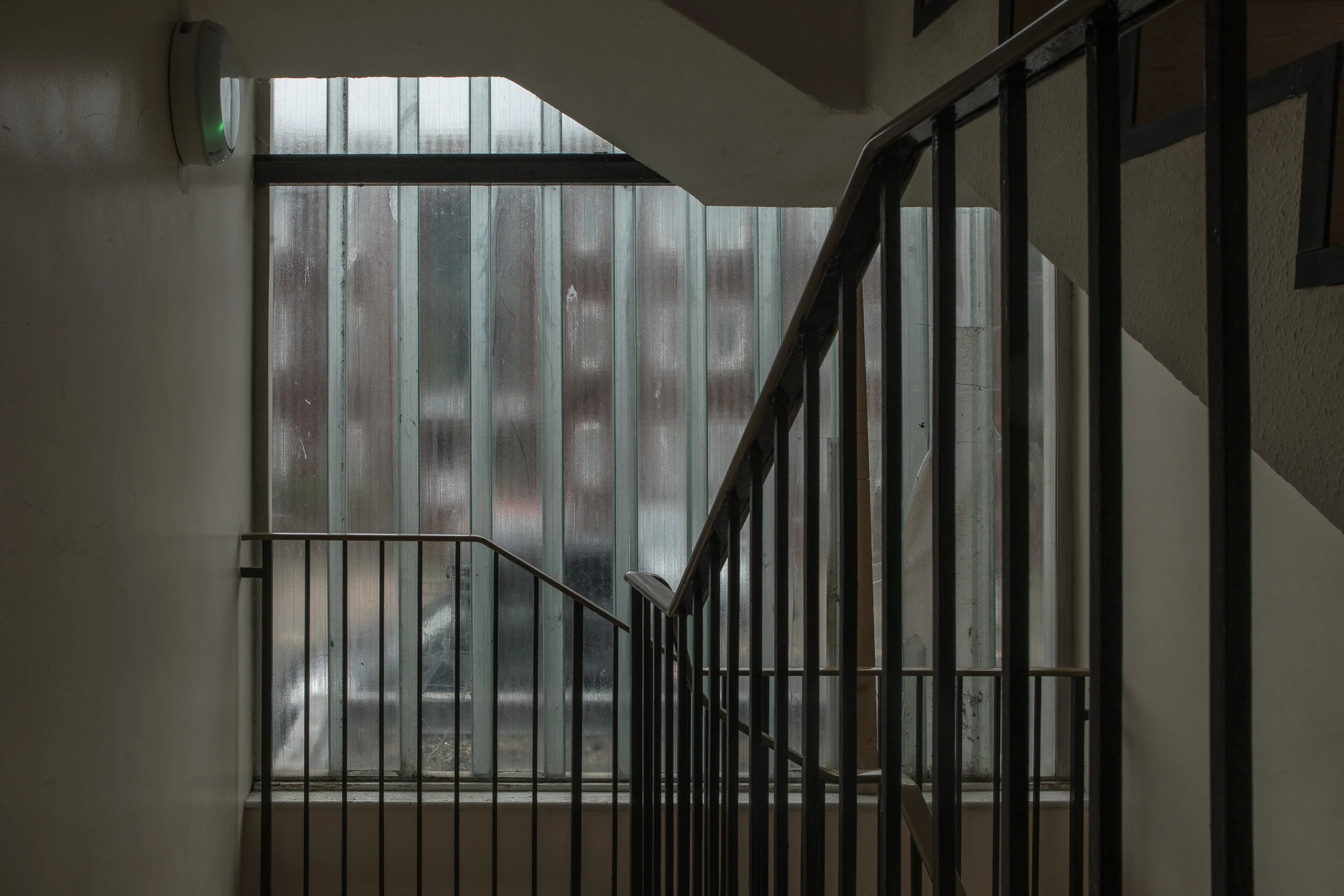 stair well, broken window