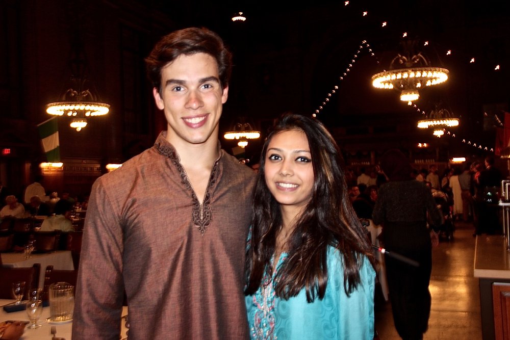 Nico Religa and Anya Malik complement each other in traditional Indian outfits.