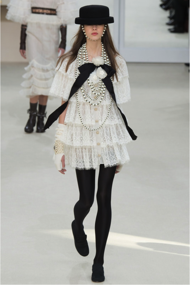 Voluminous lace and a tiered silhouette are both flattering and roomy, and the black tights make it perfect for winter. Once you’re done with your 10th helping, you can strap your plate and bowl onto the top of your head, as pictured here.