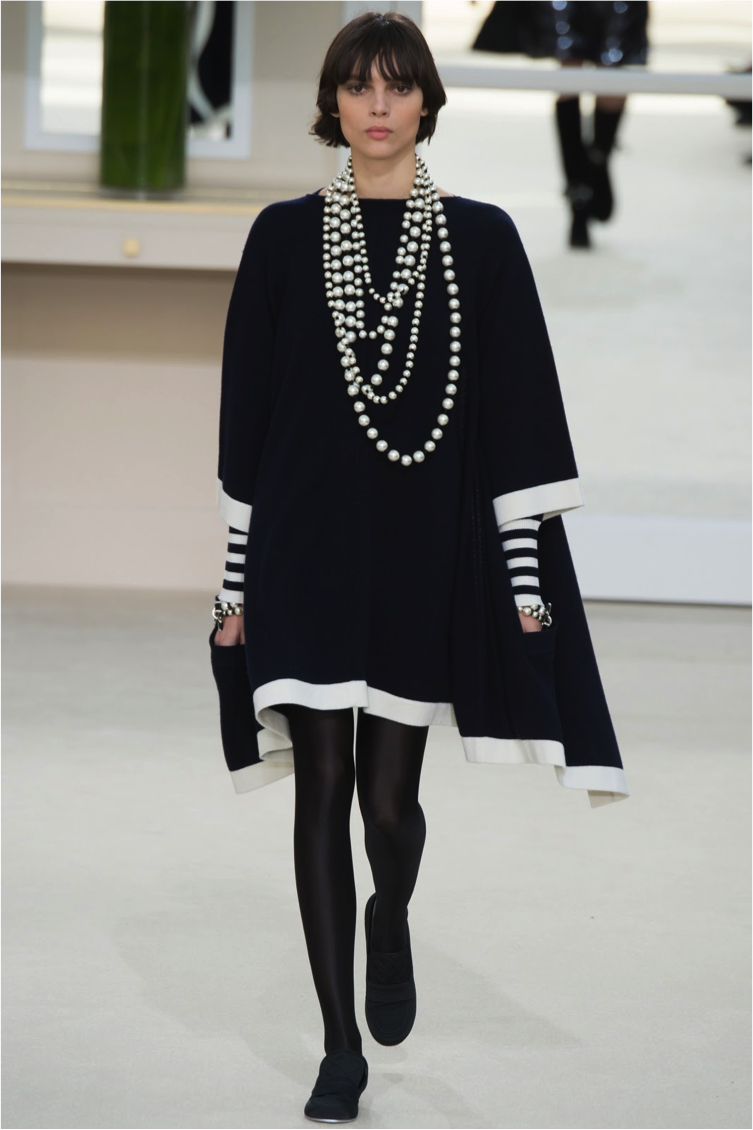 This outfit is actually lovely. Stretchy tights, flowy sweater dress, practical flats, and statement pearl strands: what more could you ask for? It’s the epitome of comfort and elegance, with plenty of room for your holiday meal.