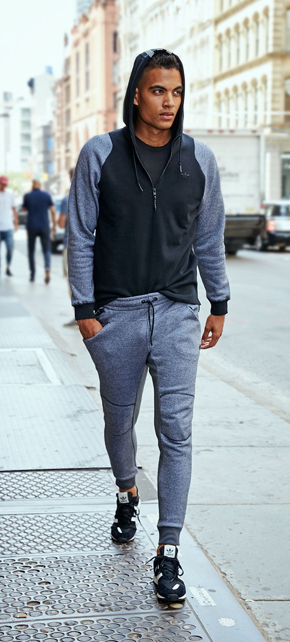 Track style jacket paired with gray joggers for a comfy street look (Image via Media Cache )