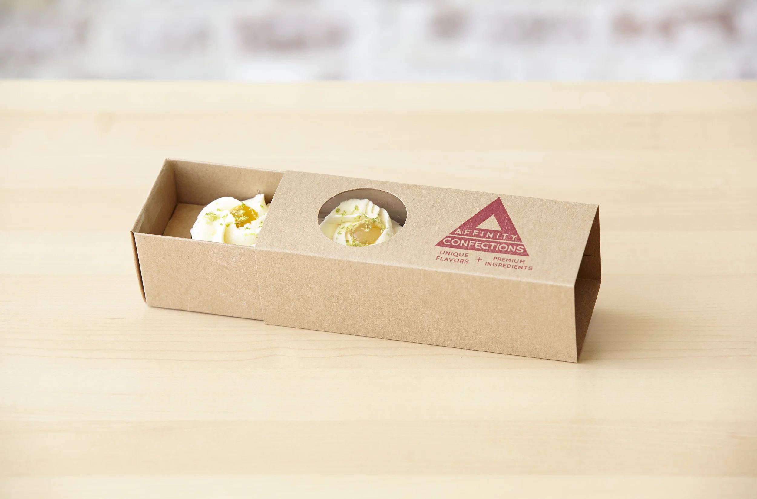 Individual 2 piece box featuring our Mango-lime cupcakes 