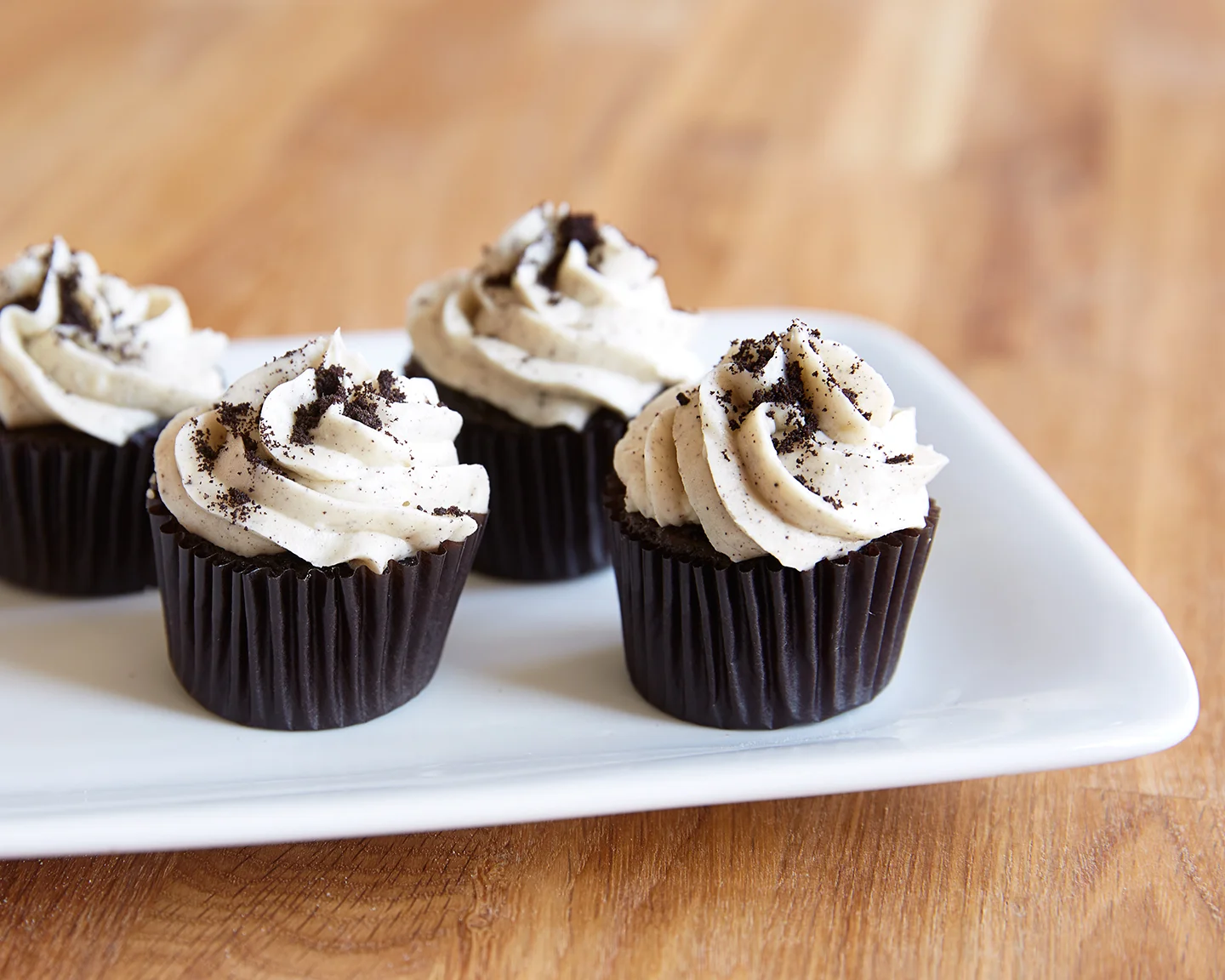 Noir Chocolate cupcake W/ cream frosting infused with chocolate wafers