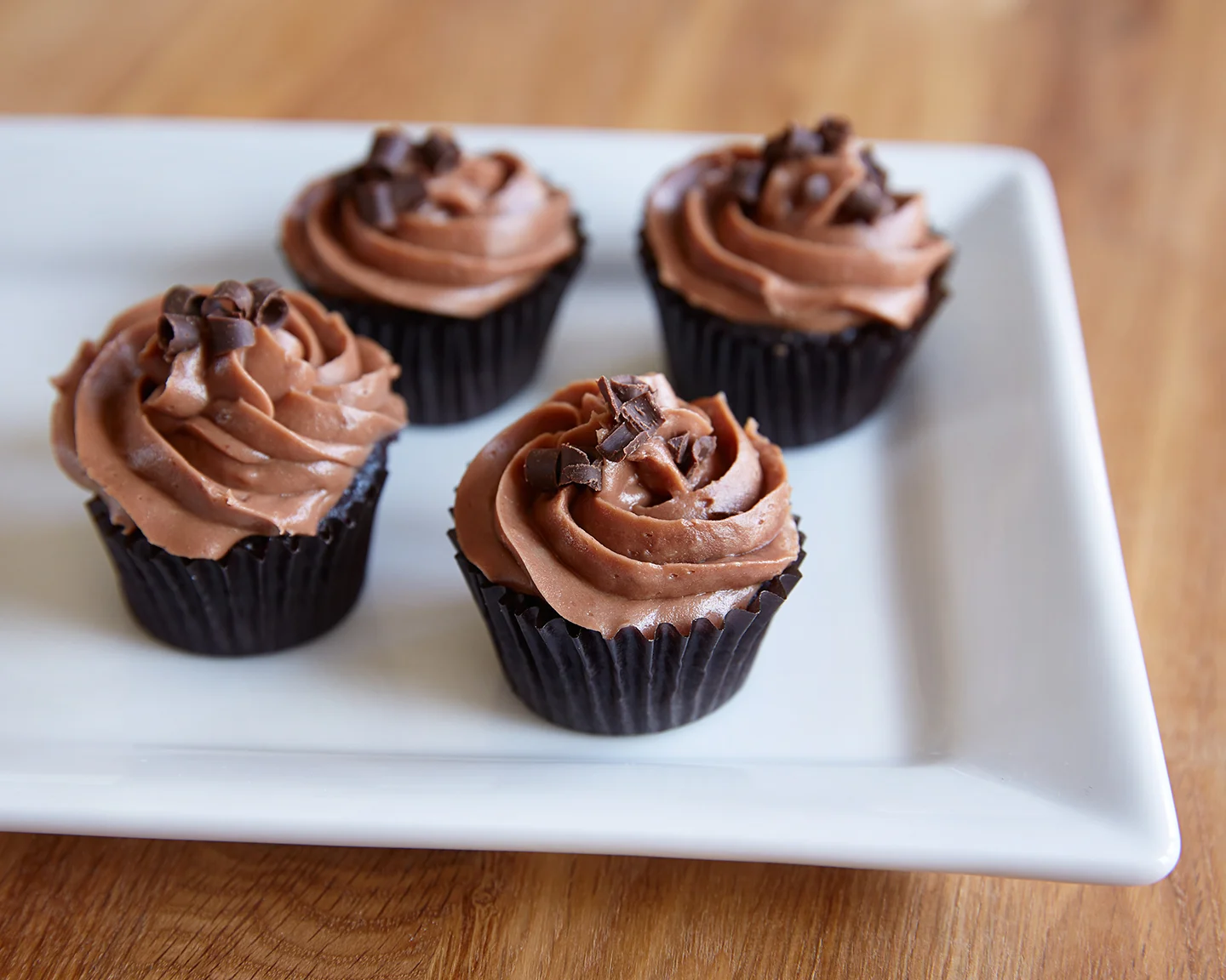  Bordeaux Chocolate Cupcake W/Mocha Mousse Buttercream Topped W/ Semi Sweet Chocolate Shavings