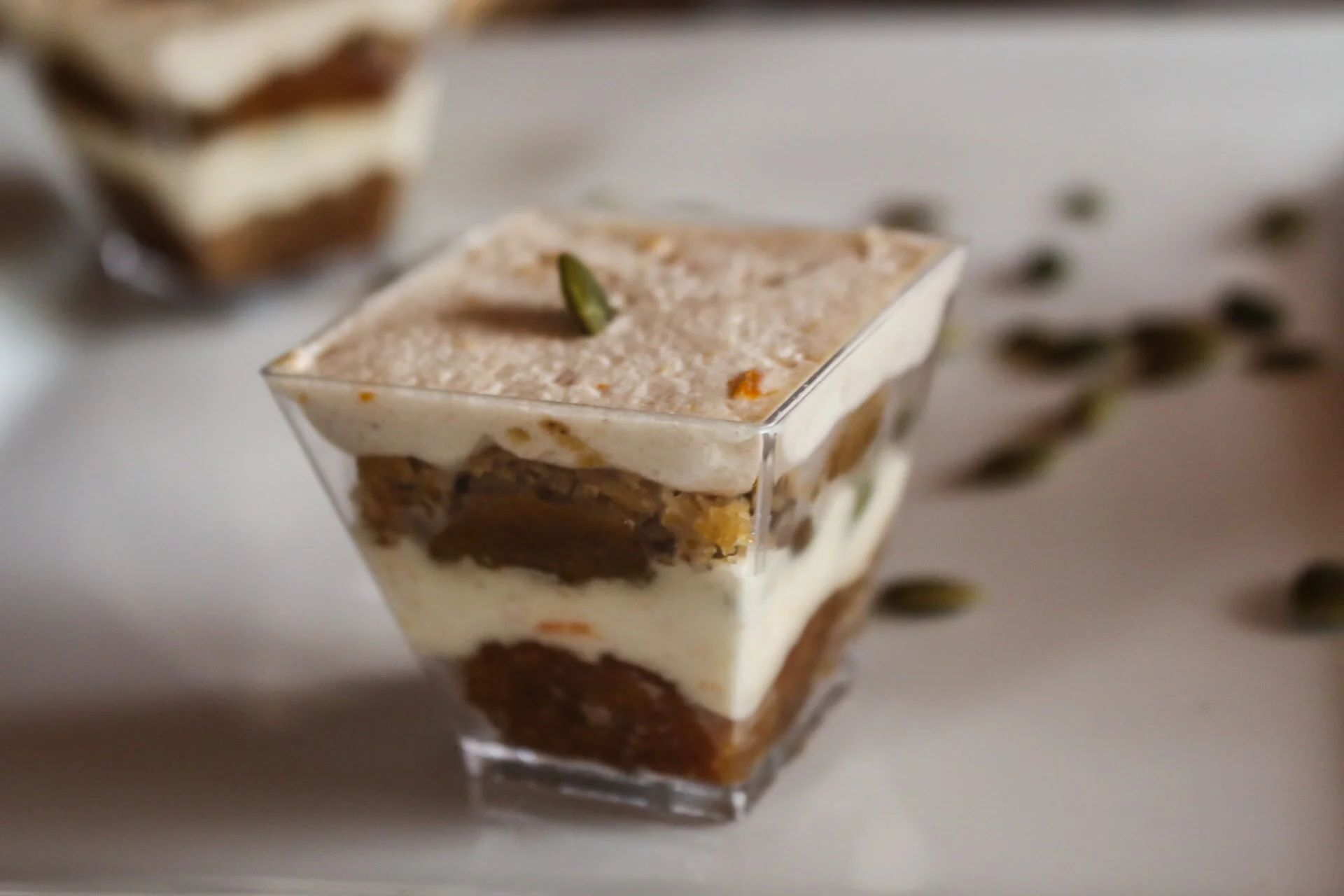 Pumpkin Trifle Layers of roasted pumpkin cake with a freshly ground cinnamon & orange whipped cream & toasted pumpkin seeds