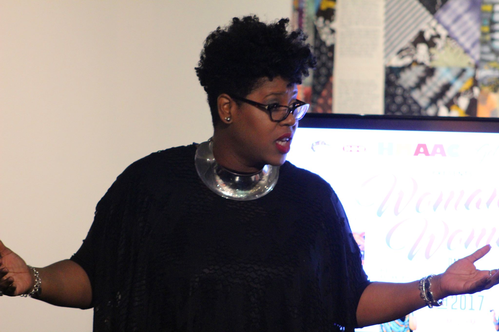 Ms. Smith delivering a powerful and compelling lecture at the Houston Museum of African American Culture on living life successfully.