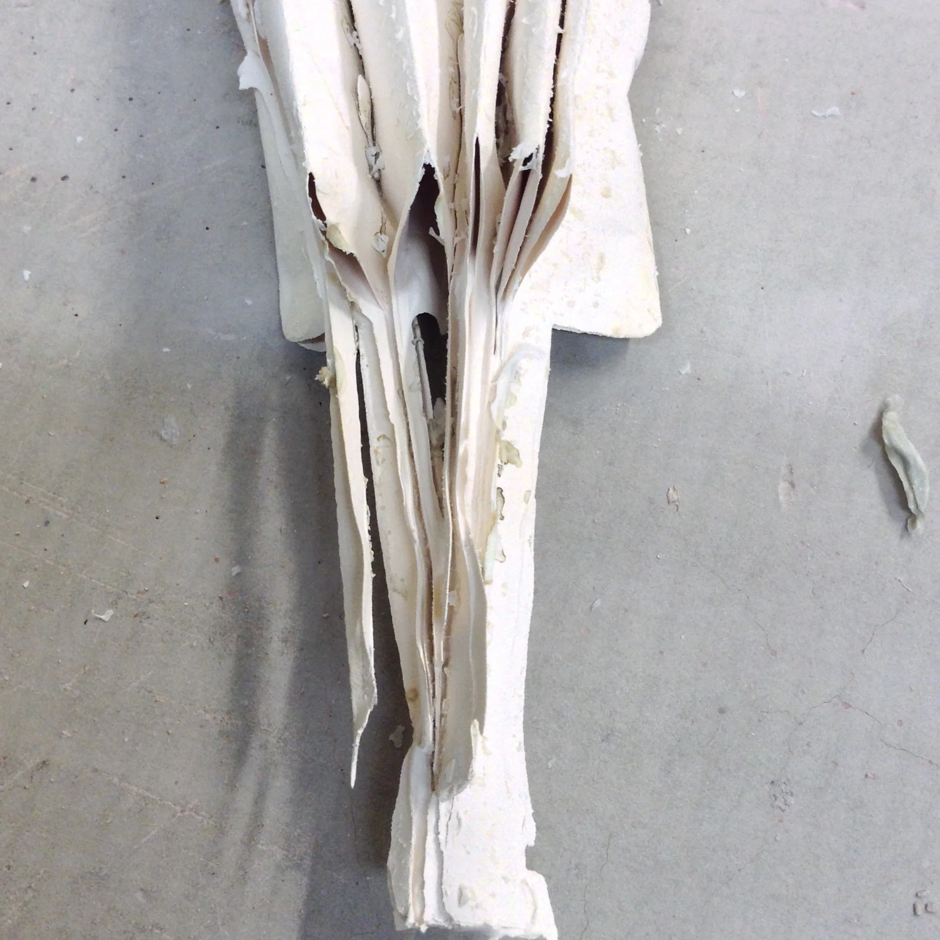 Clay form made from the collapse of a star-shaped, paper tube, pleated for strength, but not enough!