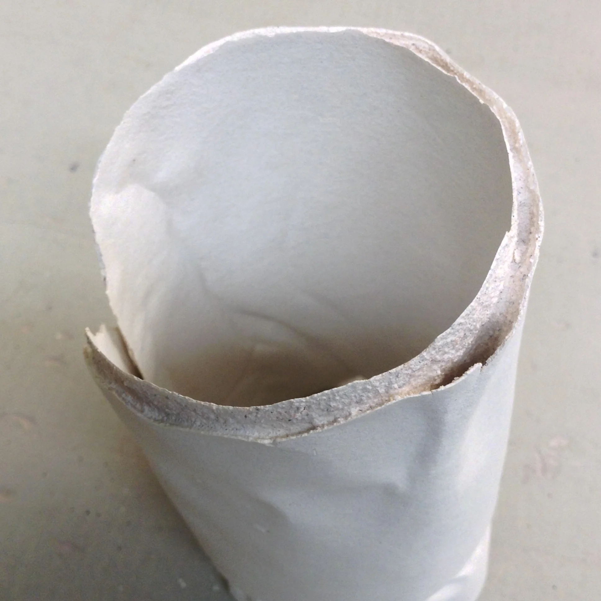 Using newspaper and pleated copy paper to cast new clay shapes