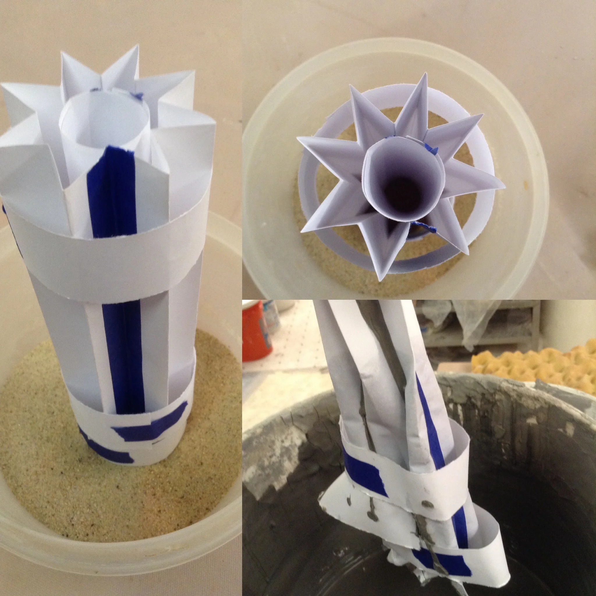 Paper folded shapes intended to make a hollow, star-shaped extrusion. Paper immediately softened, buckled outward, and leaked downward into sand catch basin. But not all was lost!