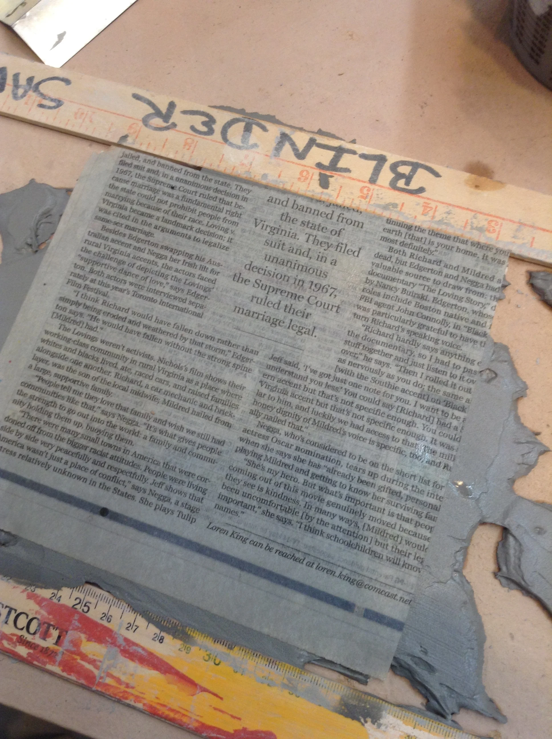 Excess size of thinly spread slip covered on second side with newspaper. Excess slip was scooped away and was perfectly usable for another project.