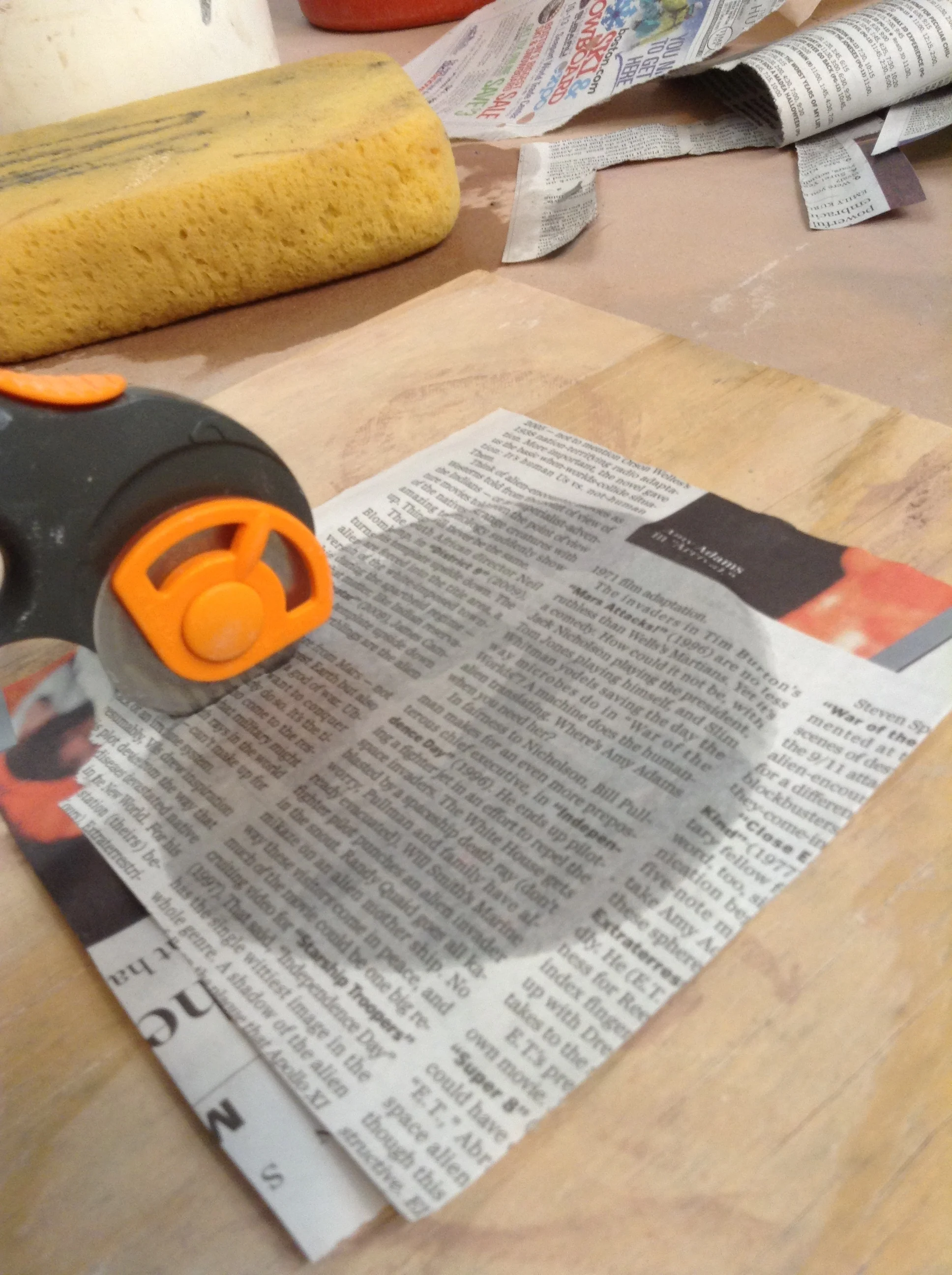The fabric rotary cutter shown here makes good cuts, but seemed to get dull quickly. This laminate is certainly not official rotary cutting material. Soon afterward I experimented with making cuts with plain scissors and liked it much better.