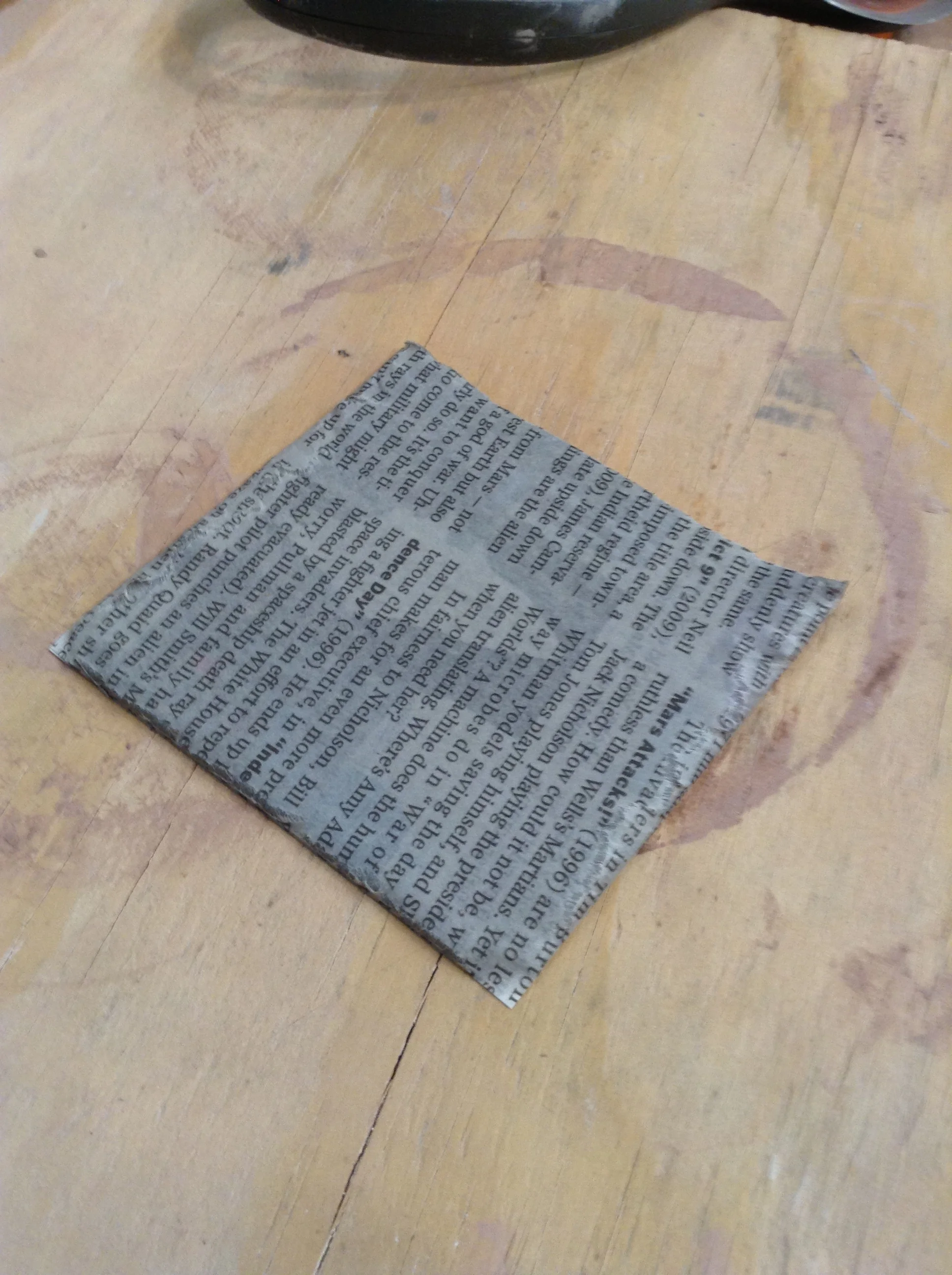The prepared square laminate. Cuts at edges are slightly compressed and don't squeeze open too easily. This would leave a distinct edge I can easily accept as a natural part of the process. But I bet they're sharp when finished.