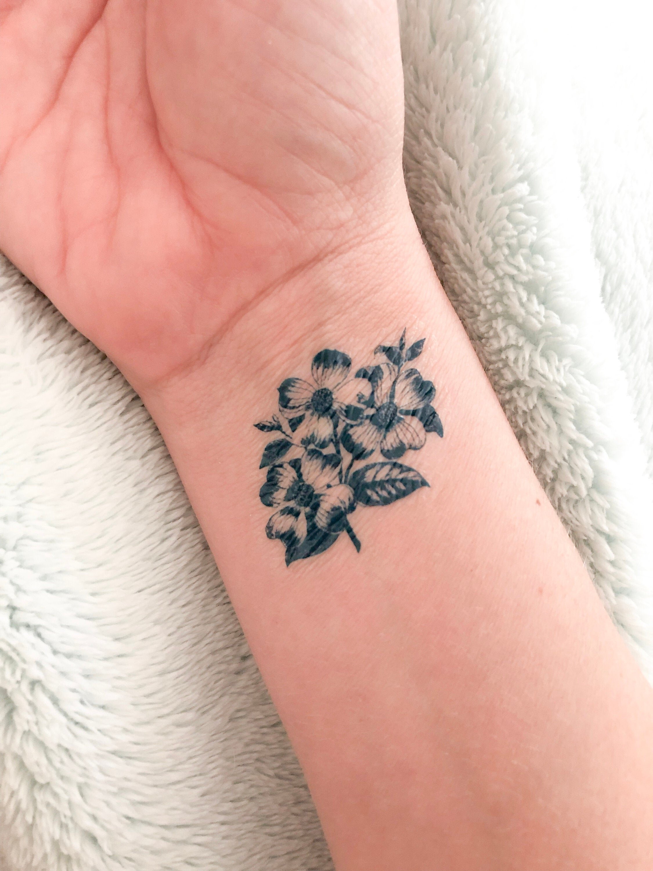 Top 59 Best Dogwood Flower Tattoo Ideas  2021 Inspiration Guide  Dogwood  flower tattoos Dogwood tattoo Flower tattoos