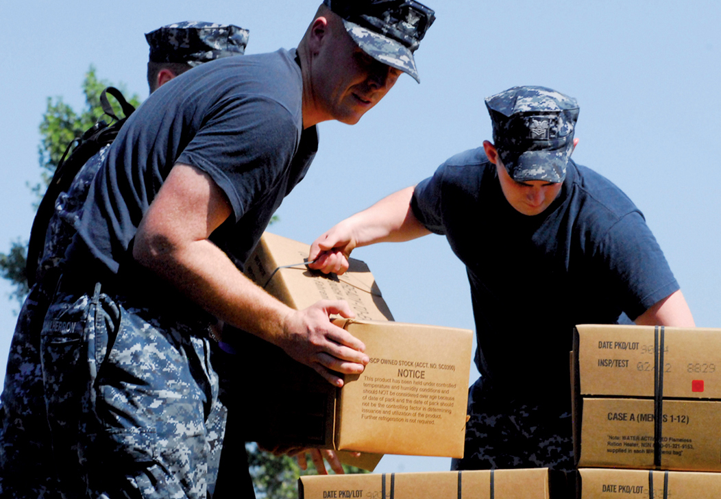 U.S. Navy distributed food at our surrounding schools. These MREs (meals ready to eat) are a blessing to children and their families.