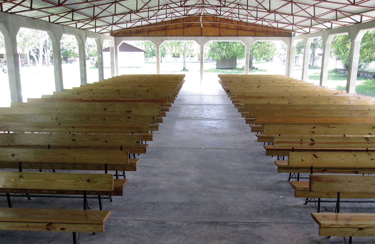 New church benches have been installed at our church in Signeau, Haiti, and also at our high school chapel. 