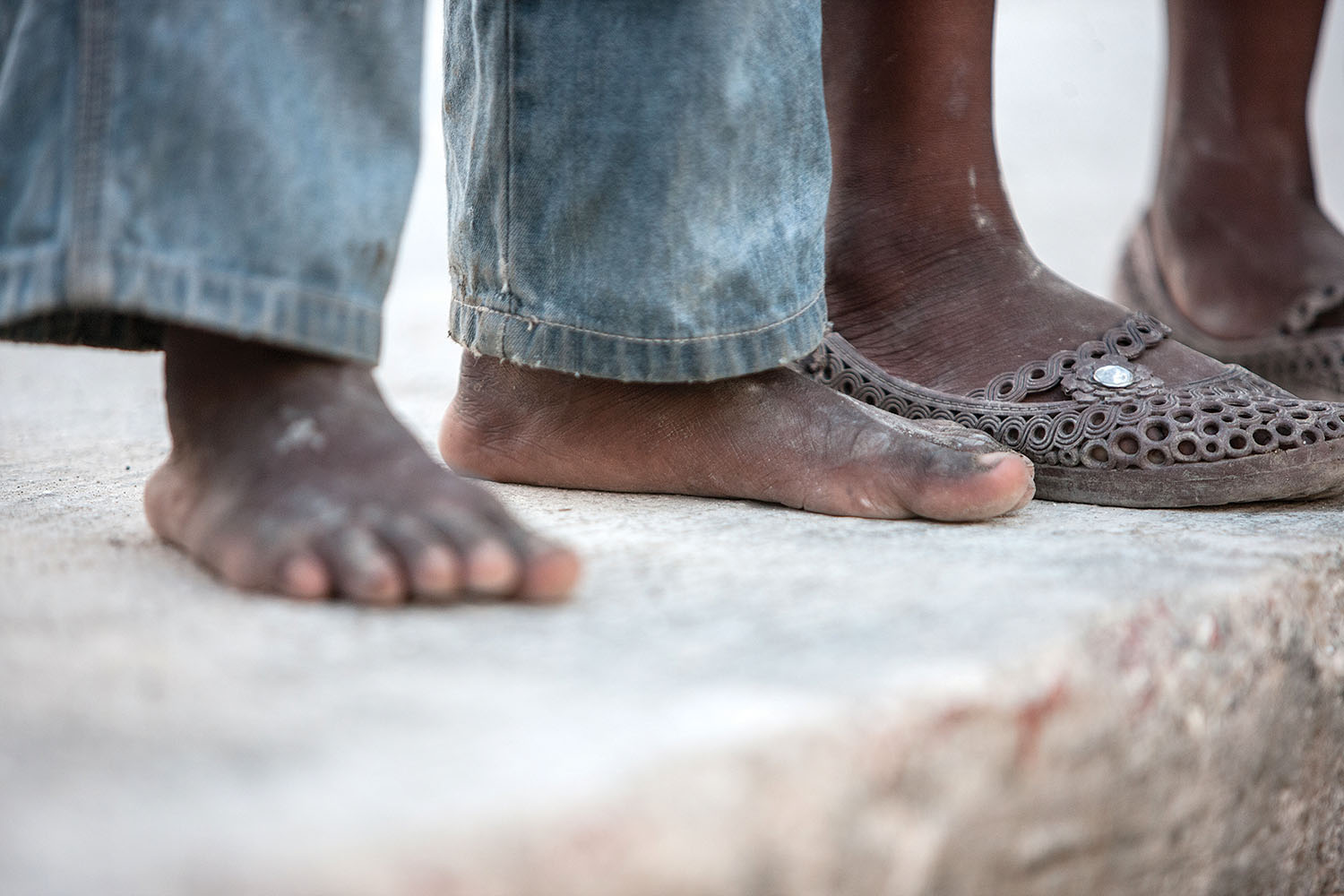 None of us like to see our Haitian children barefooted.