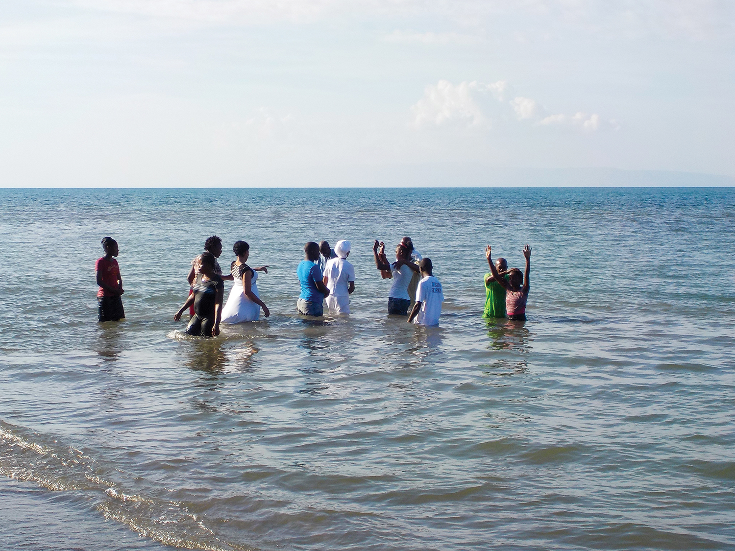 We celebrate with the 52 Haitians following in believer's baptism.